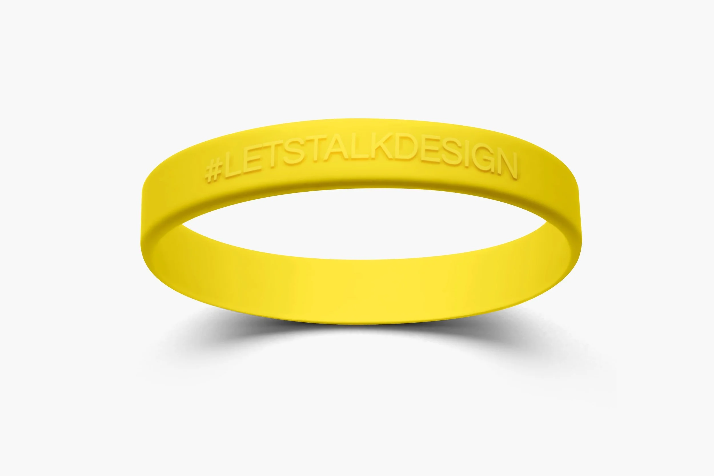 Embossed silicone wristband with the design raised above the band