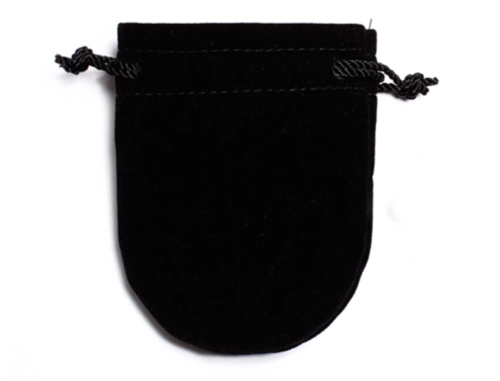 Cufflinks in a soft black velvet drawstring pouch