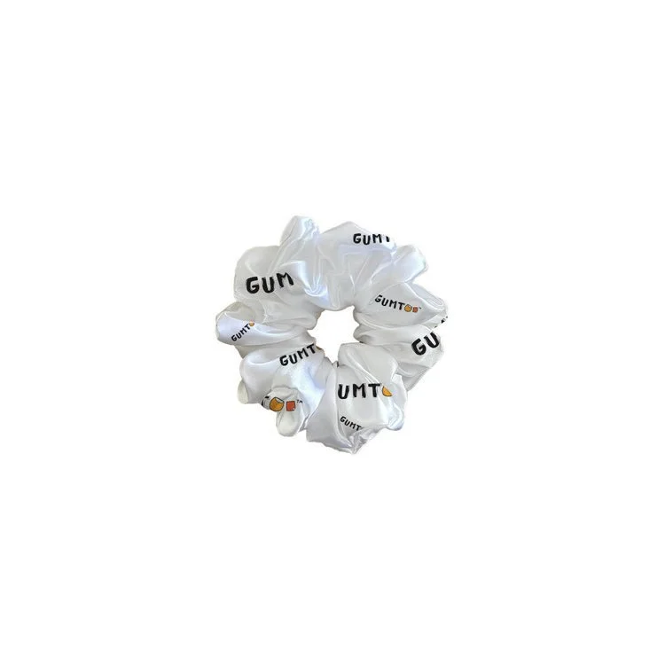 Custom scrunchie made in silk fabric with a soft sheen