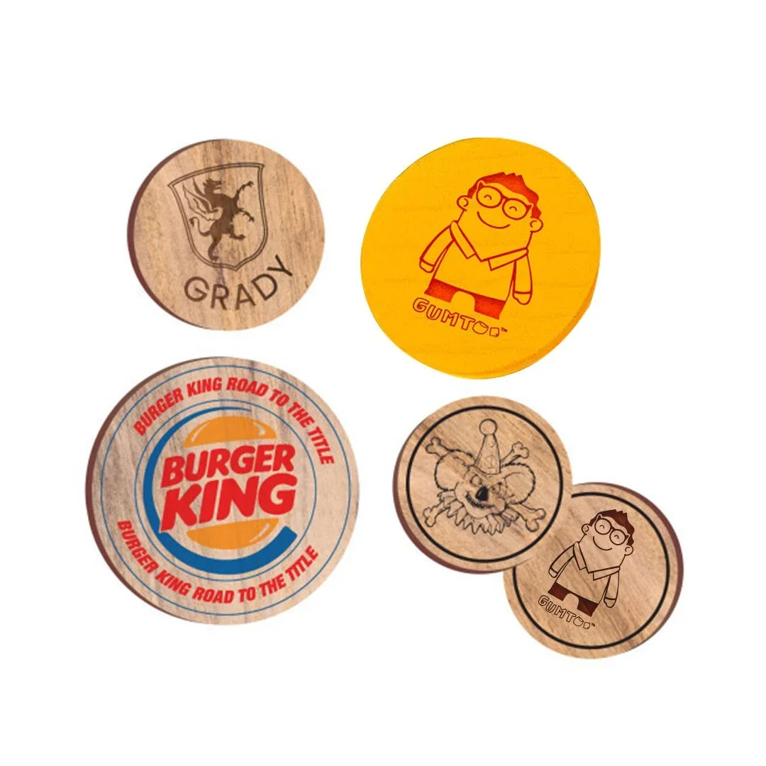 Custom wooden coins in assorted sizes with printed and engraved logos, tailored tokens for brand campaigns, retail merchandise Malaysia