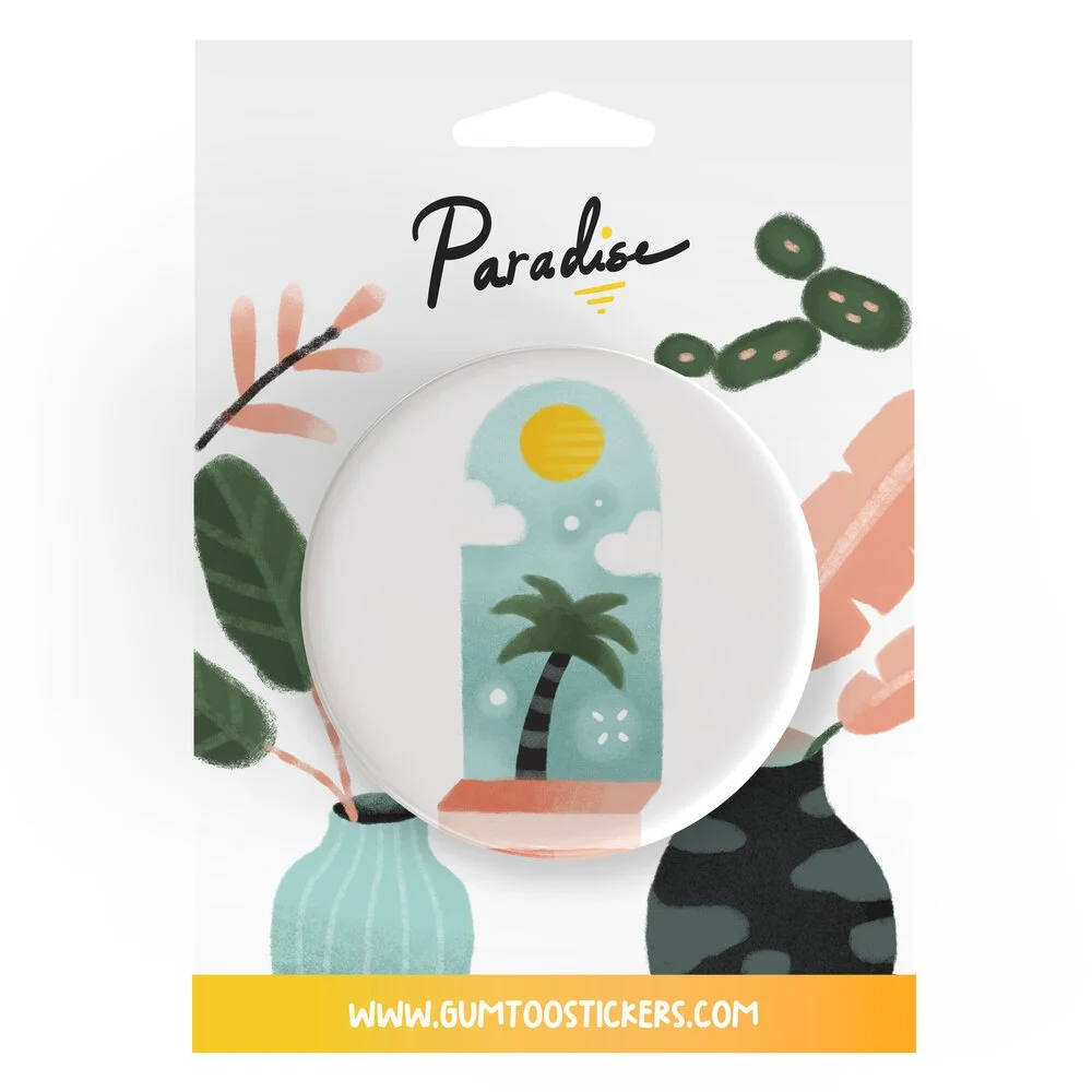 Custom button badges presented on branded card packaging