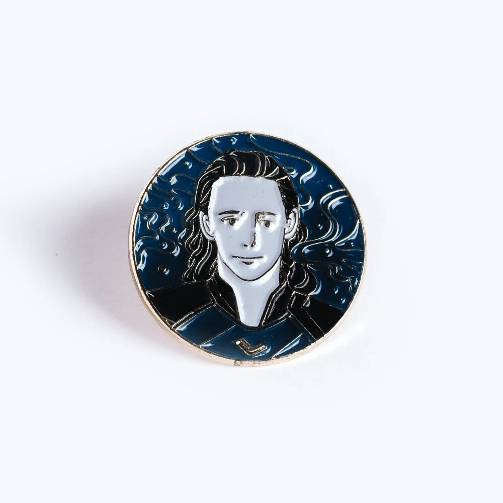 Soft enamel pin with recessed colour below the metal edges, giving a textured finish
