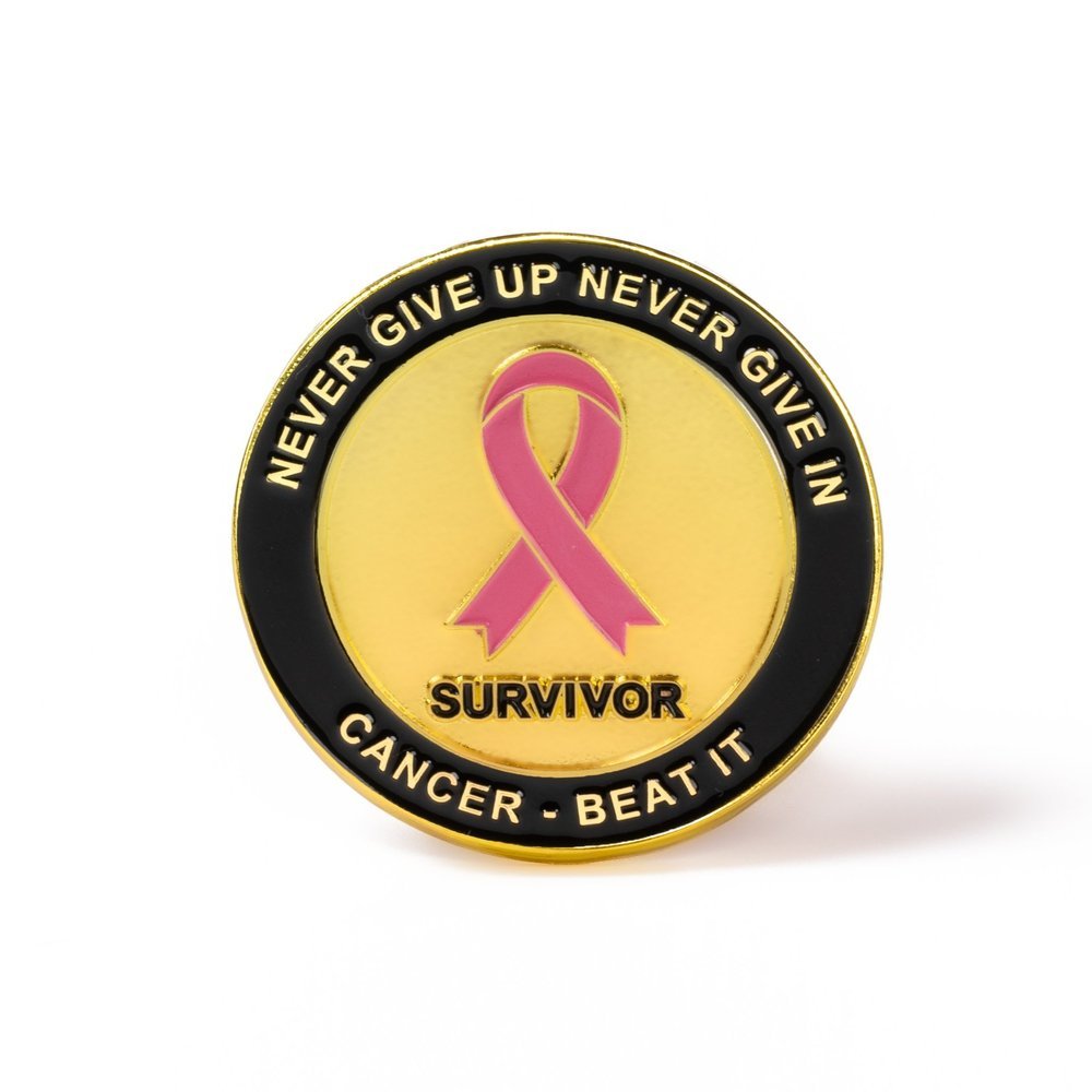 Hard enamel coin with a pink awareness ribbon and lettering, polished level with the metal edges