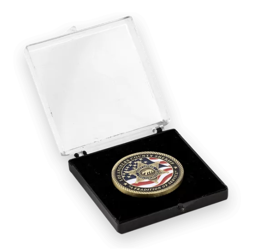 Custom coin in a clear acrylic display box with a velvet-lined holder