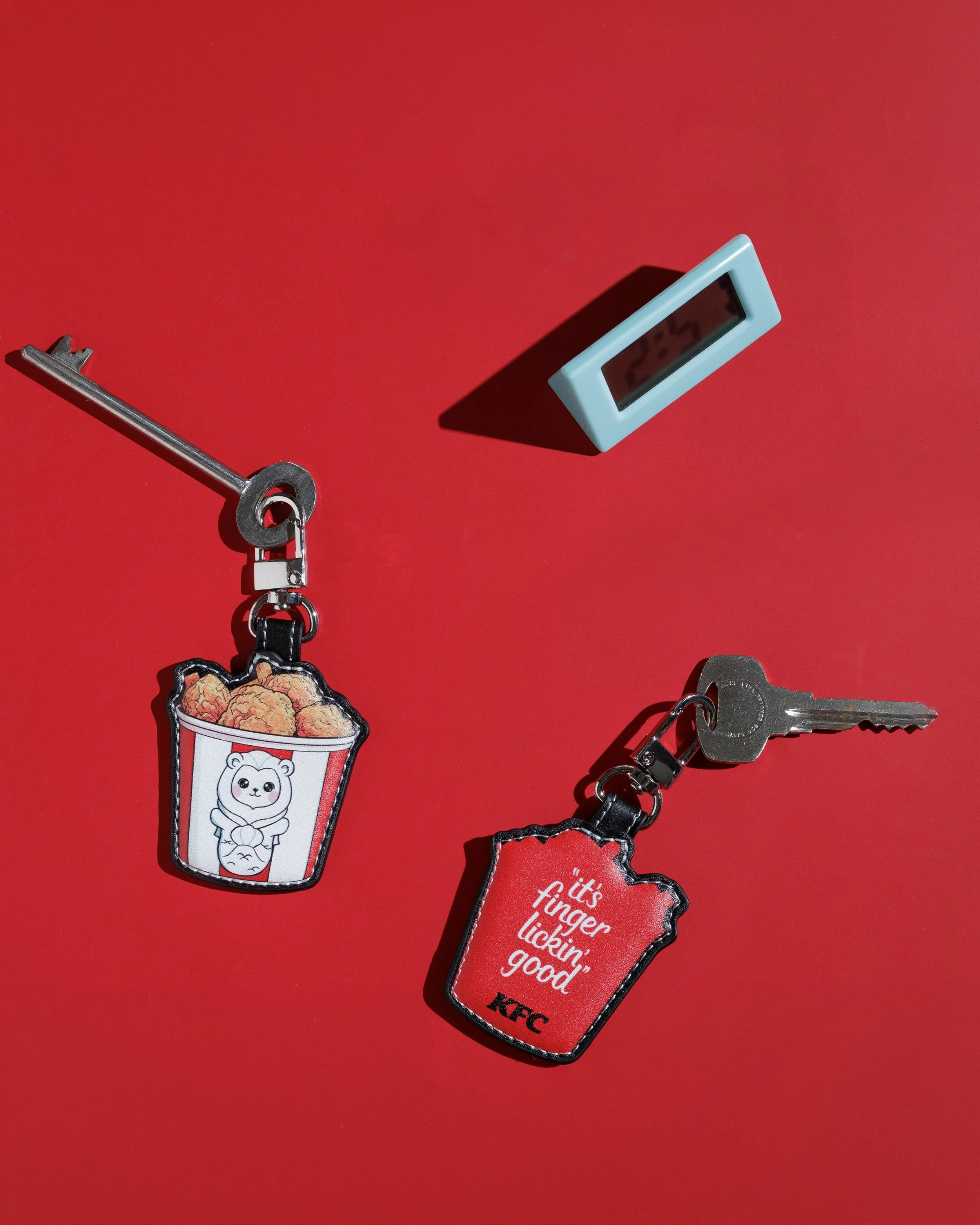 Turn your most iconic brand assets into everyday collectibles. We produced these custom stitched keychains for KFC, transforming their legendary fried chicken bucket and the classic finger lickin good slogan into a tangible and fun accessory. By turn