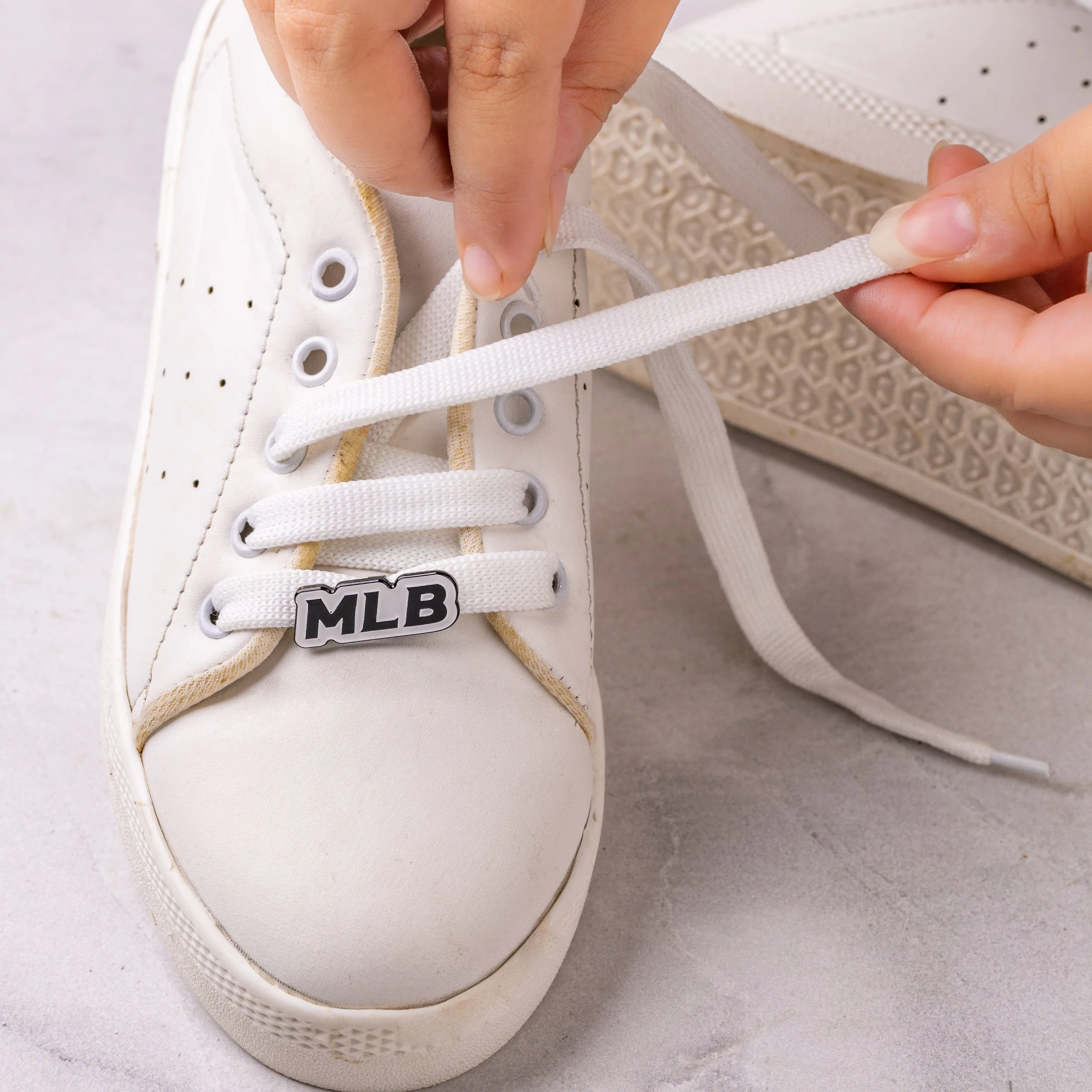 custom-shoe-dubrae-mlb-black-silver-being-fitted.jpg