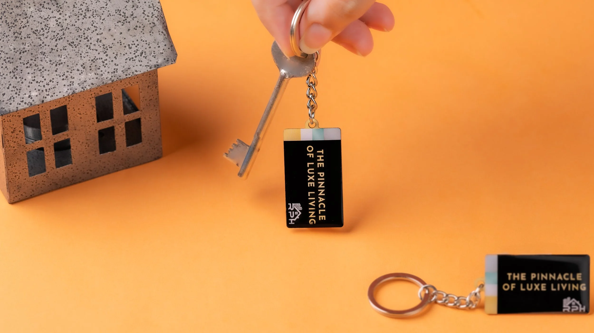 epoxy-keychain-rph-pinnacle-of-luxe-living-property.jpg.jpg