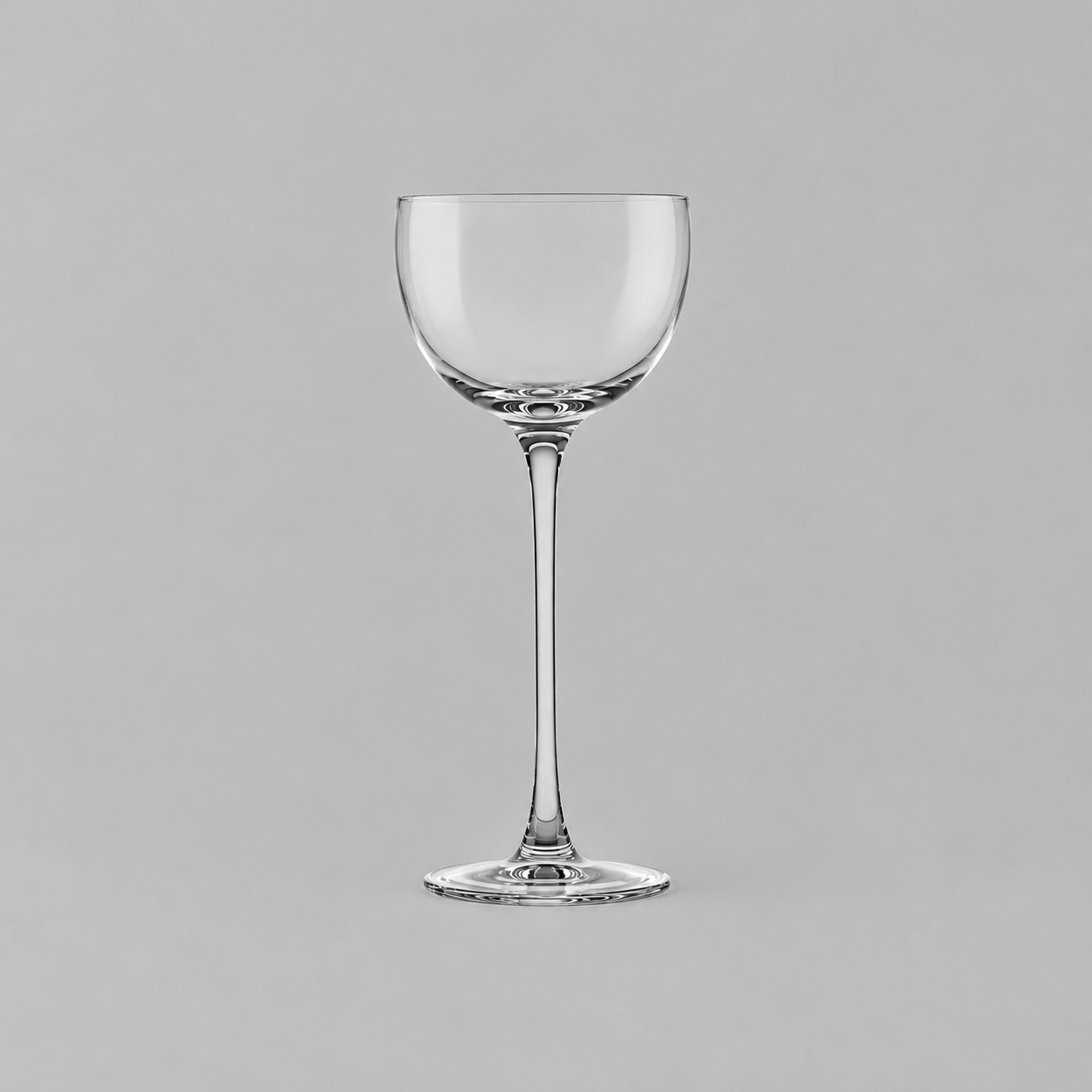 Minimalist Clear Coupe Glass on Grey.png