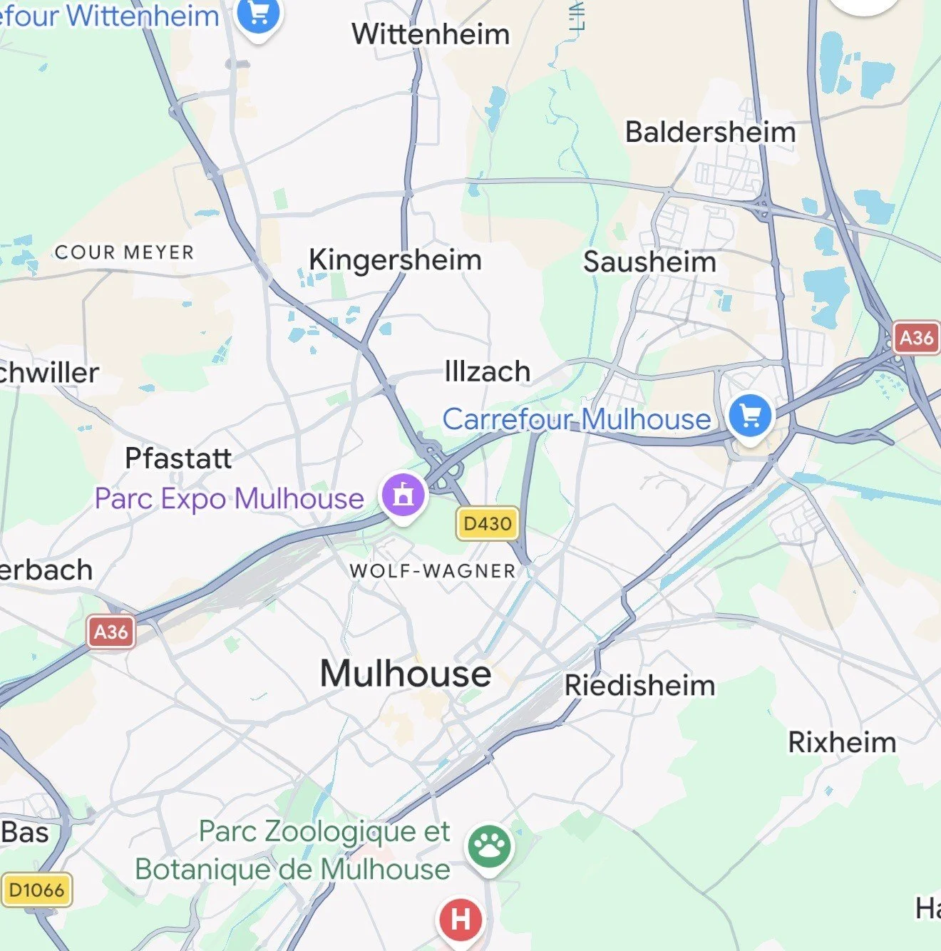 Carte montrant Mulhouse, avec lieux et routes principales, dont Carrefour Mulhouse, Parc Expo Mulhouse et plusieurs quartiers.