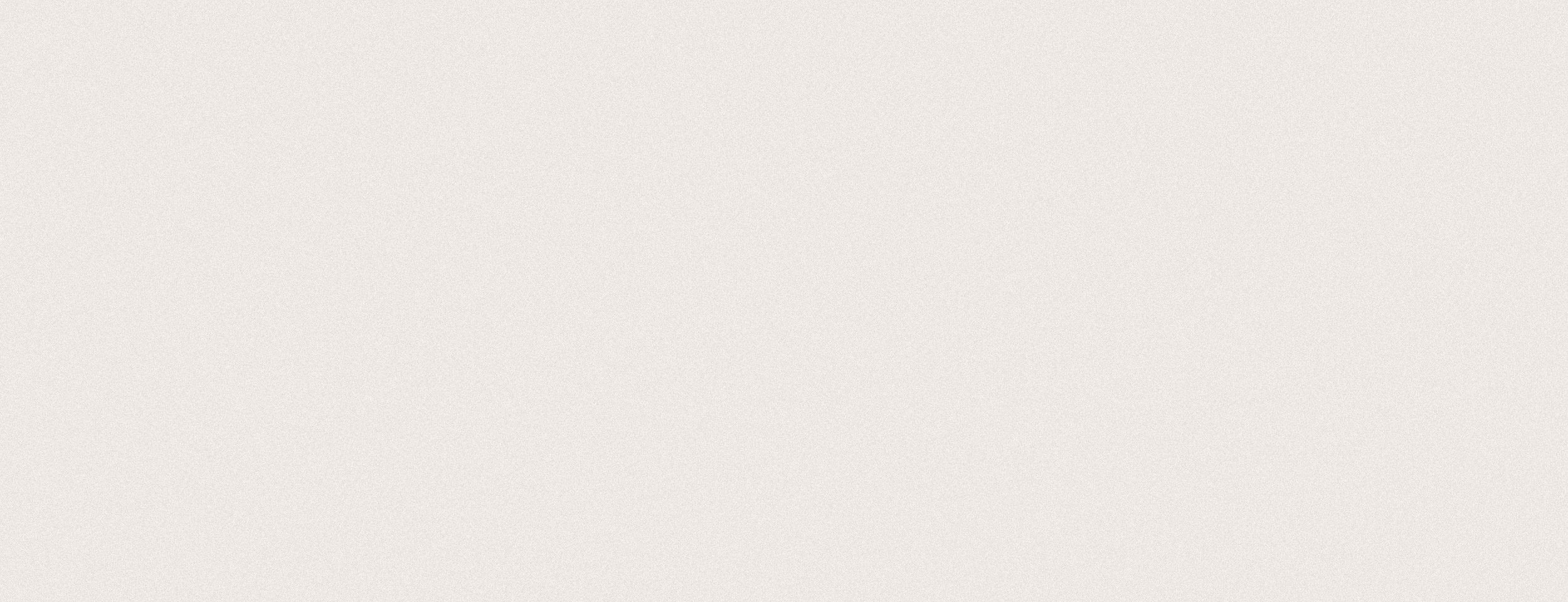 A blank, light beige background with a subtle speckled pattern.
