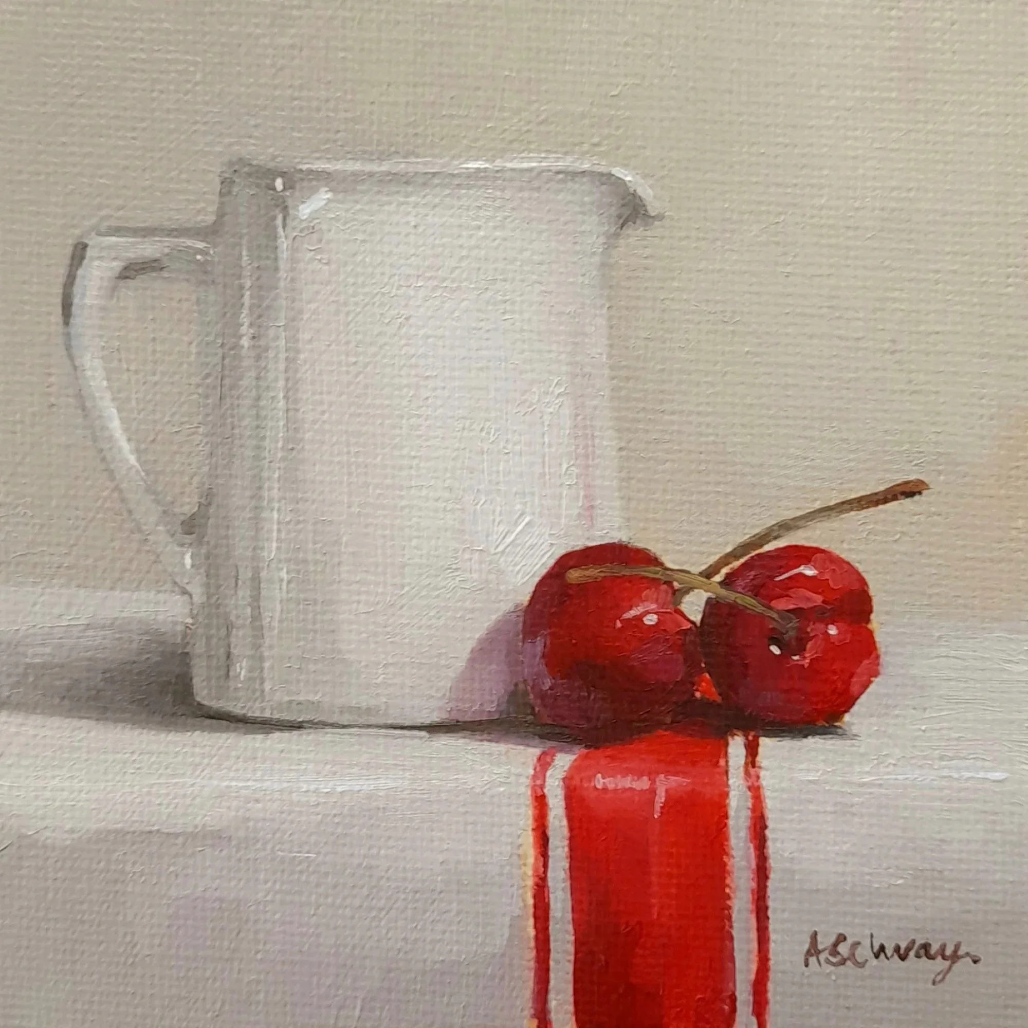Still life oil painting of two bright red cherries beside a creamware jug, set on a white cloth with a red stripe against a soft neutral background, painted in a contemporary realism style by British artist Amanda Selway