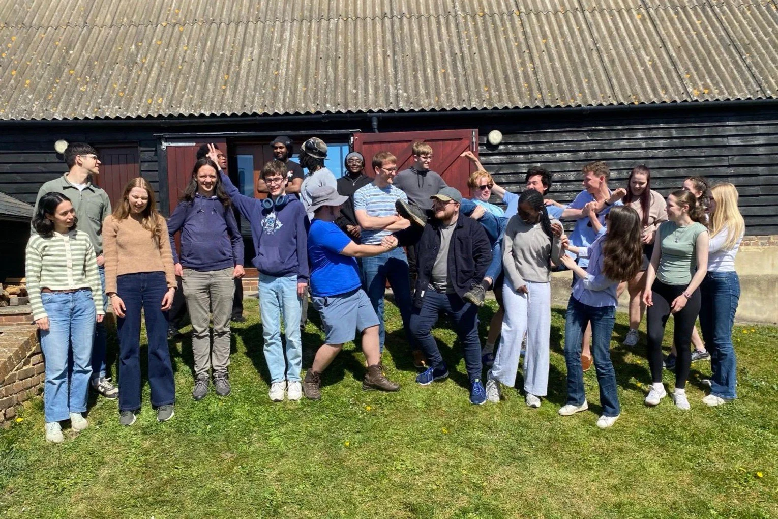 A group of university students taking a picture.