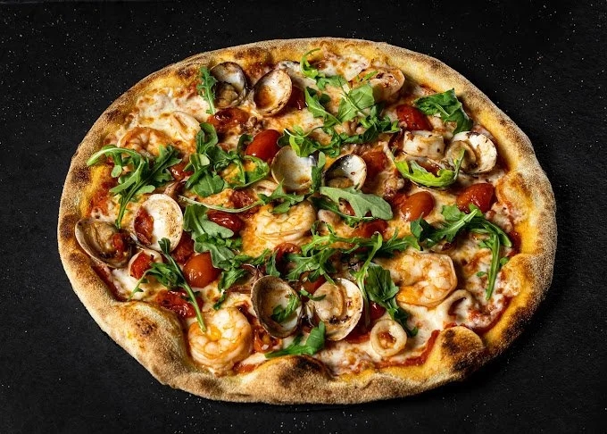 Capone’s Pizza Oven &amp; Bar