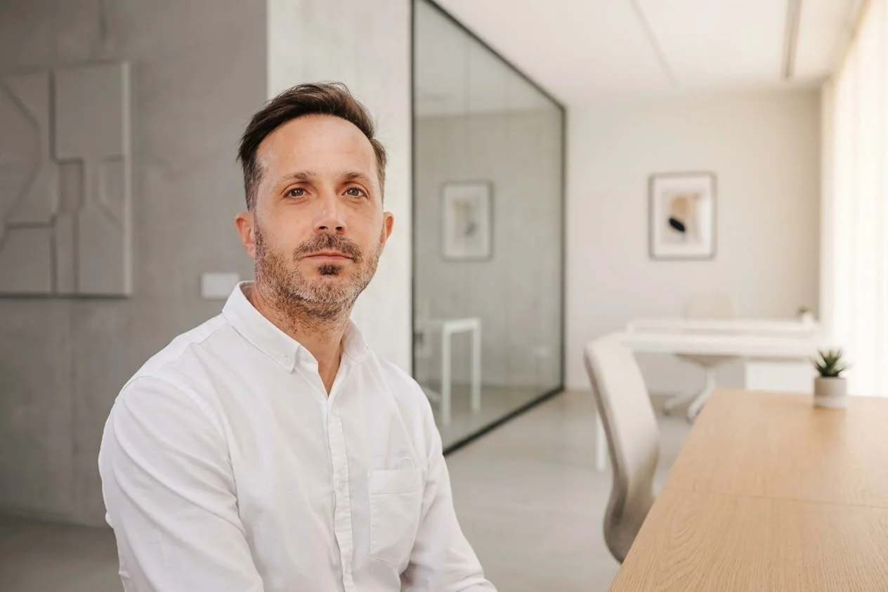 Pedro Martins, Solicitor in Lagos, Algarve, Portugal, seated in his office