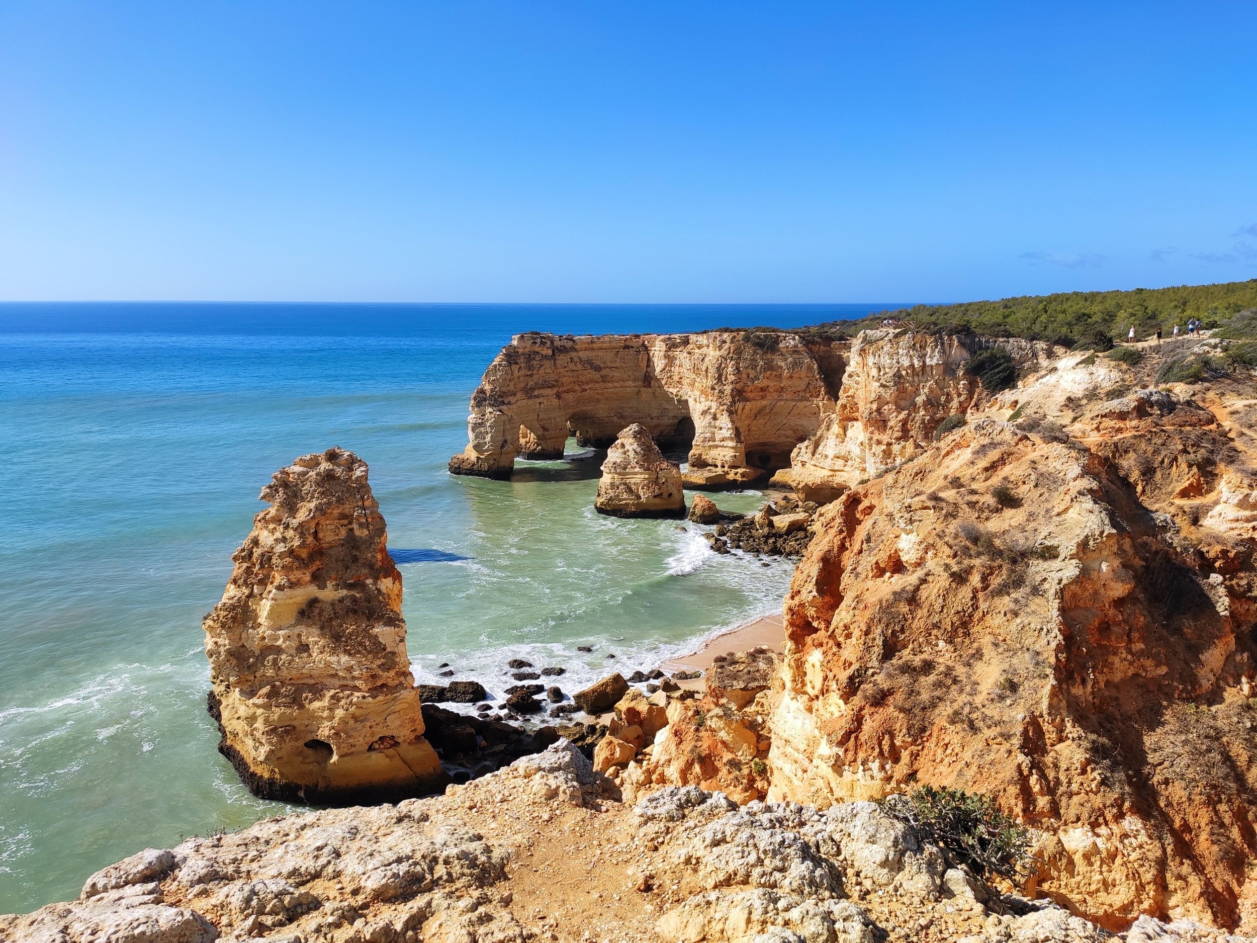 Rocky cliffs overlooking the Atlantic Ocean on the Algarve coast, Portugal.