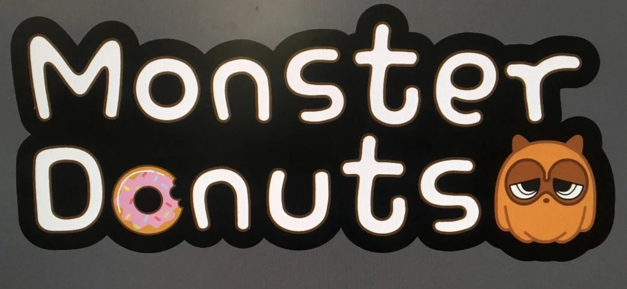 Monster Donuts with an orange monster logo