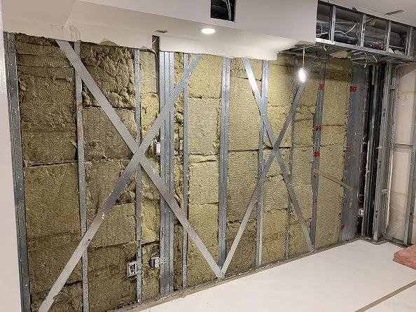 Rockwool soundproofing insulation installed at client's request during a Toronto commercial renovation