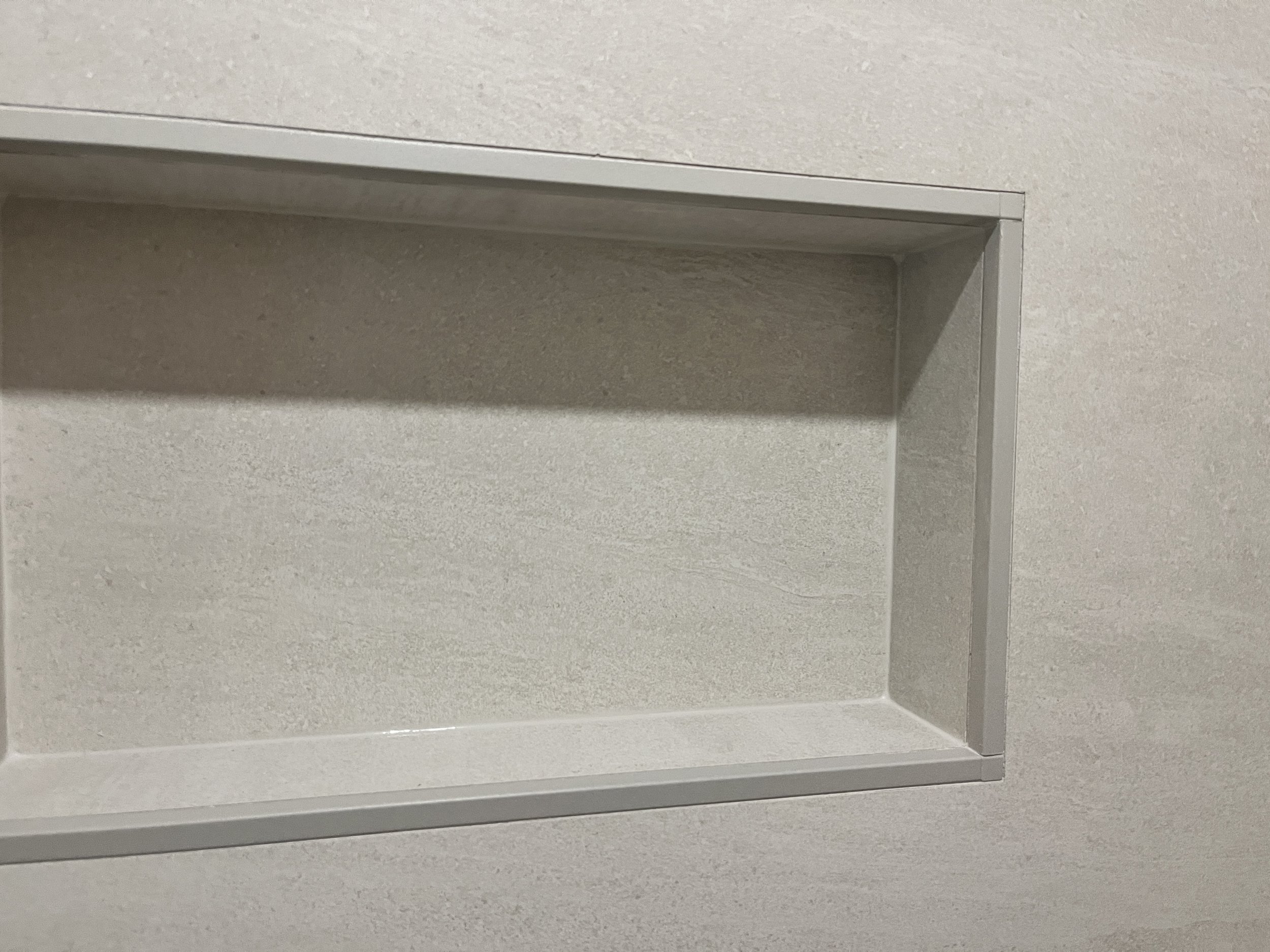 A closer look at the recessed niche — precise corner detailing shows the craftsmanship behind even the small built-in features.
