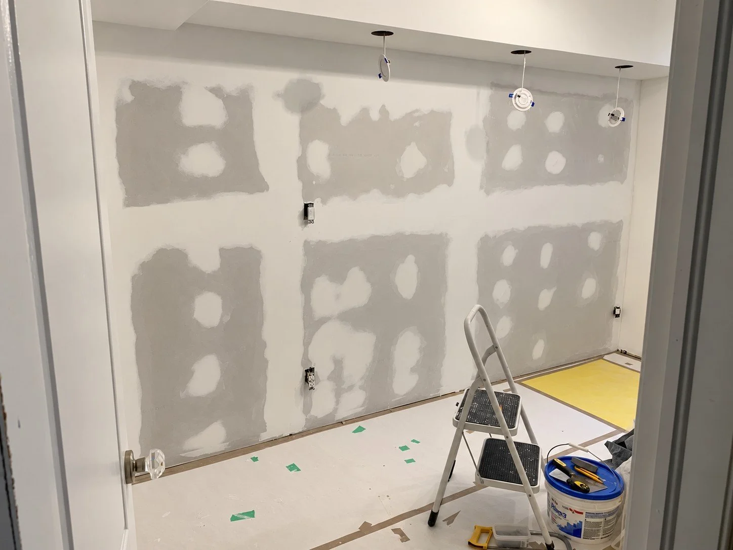 Drywall patched and ready for paint during a Toronto commercial renovation