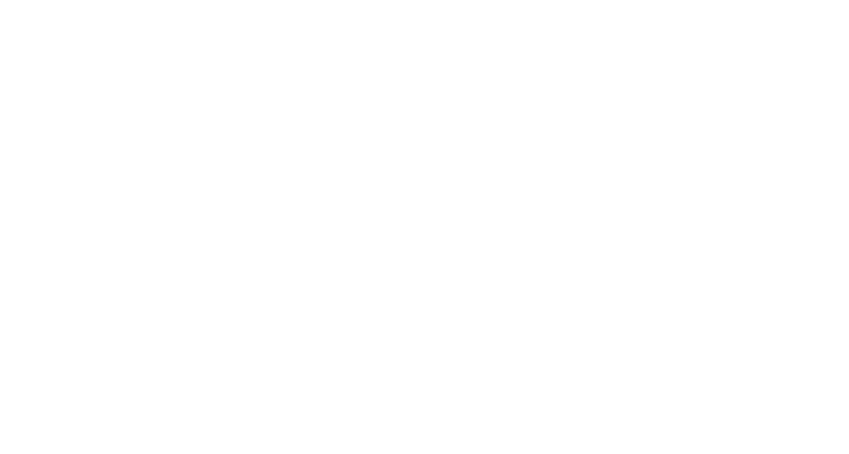 Line drawing of a desk with a chair, a stack of books, and a laptop on top. The background includes trees and the U.S. Capitol building dome.