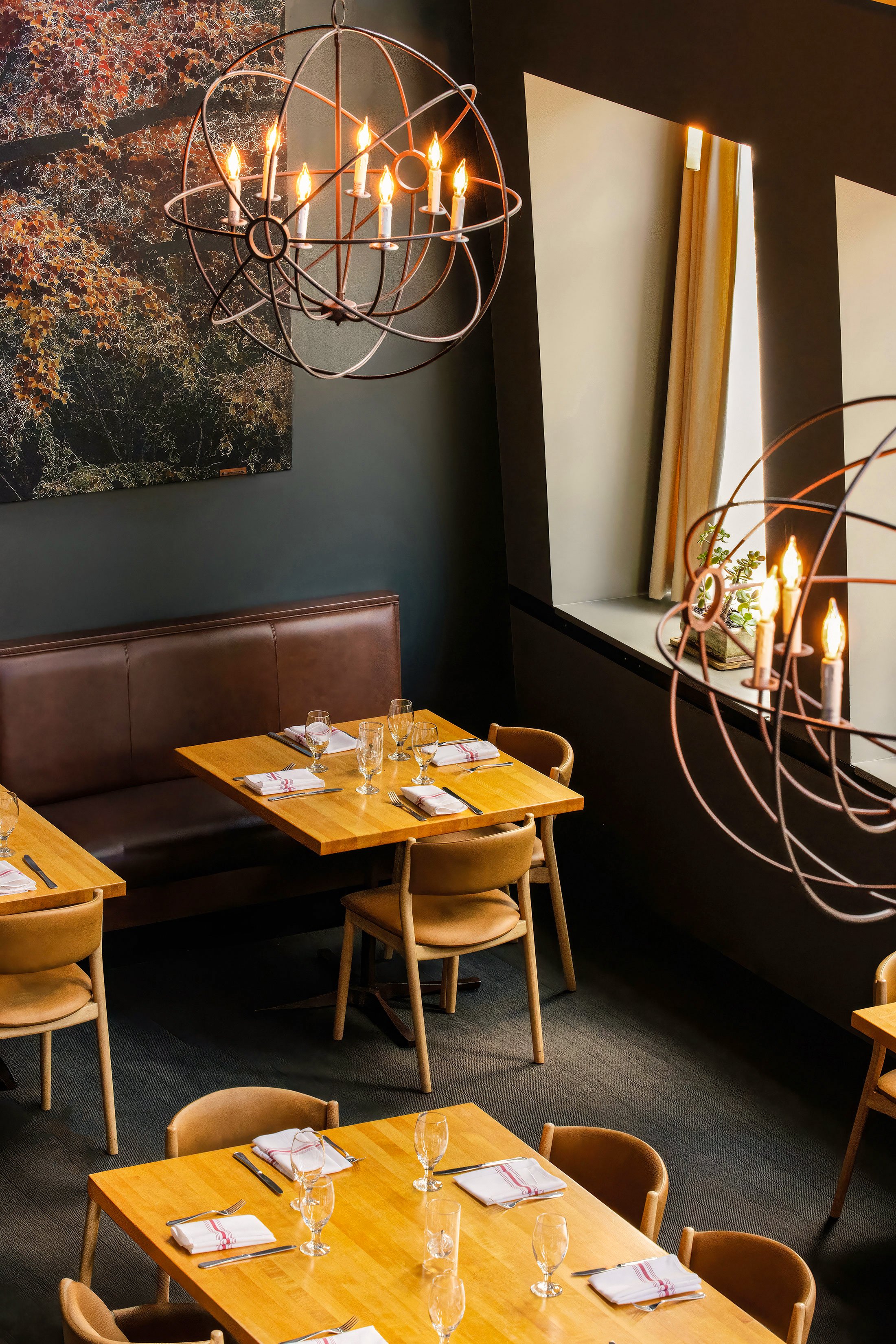 Hospitality — Intimate restaurant interior highlighting thoughtful design, warm materials, and a refined sense of place.