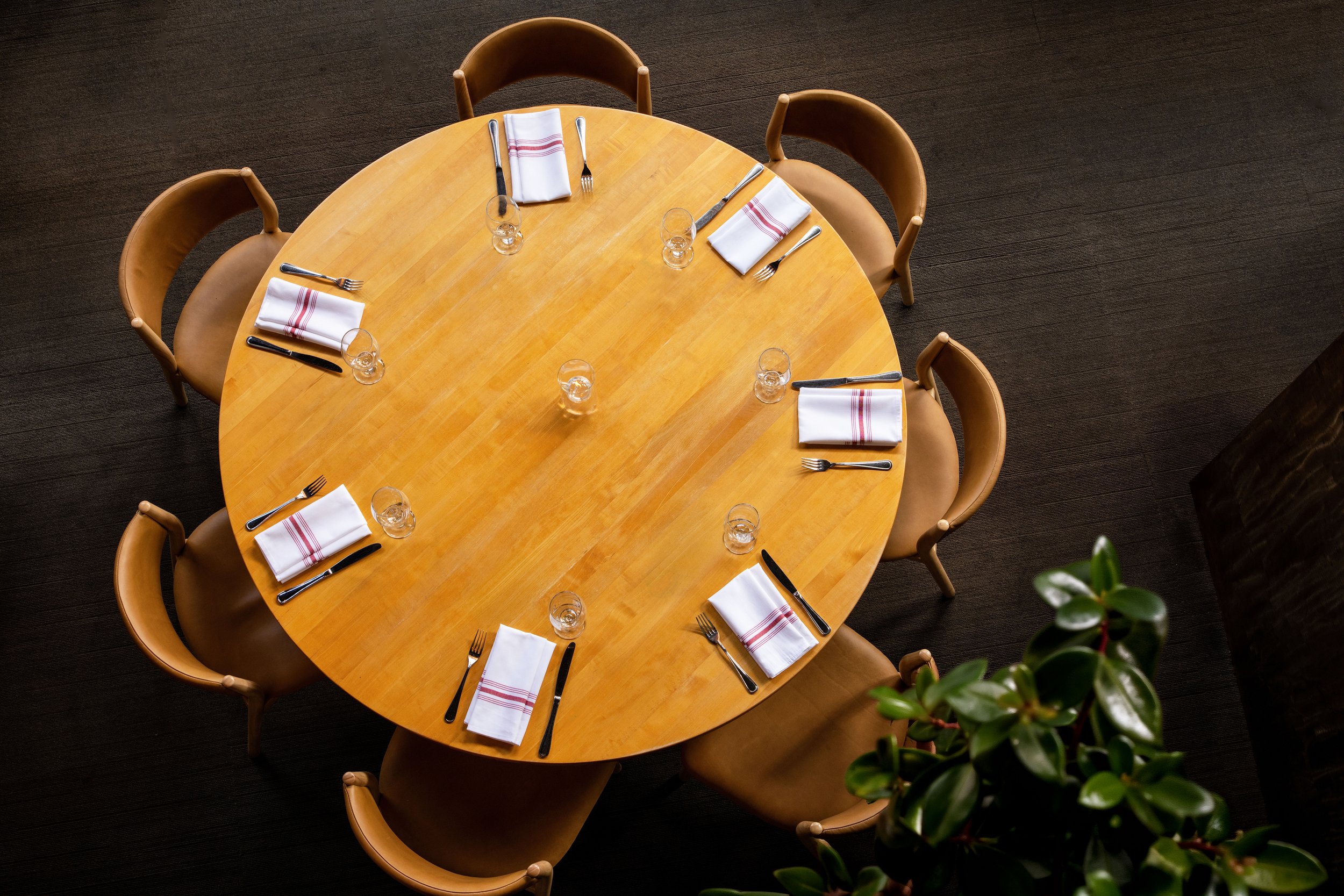 Hospitality — Warmly lit restaurant interior photographed to showcase atmosphere, design, and the guest experience.