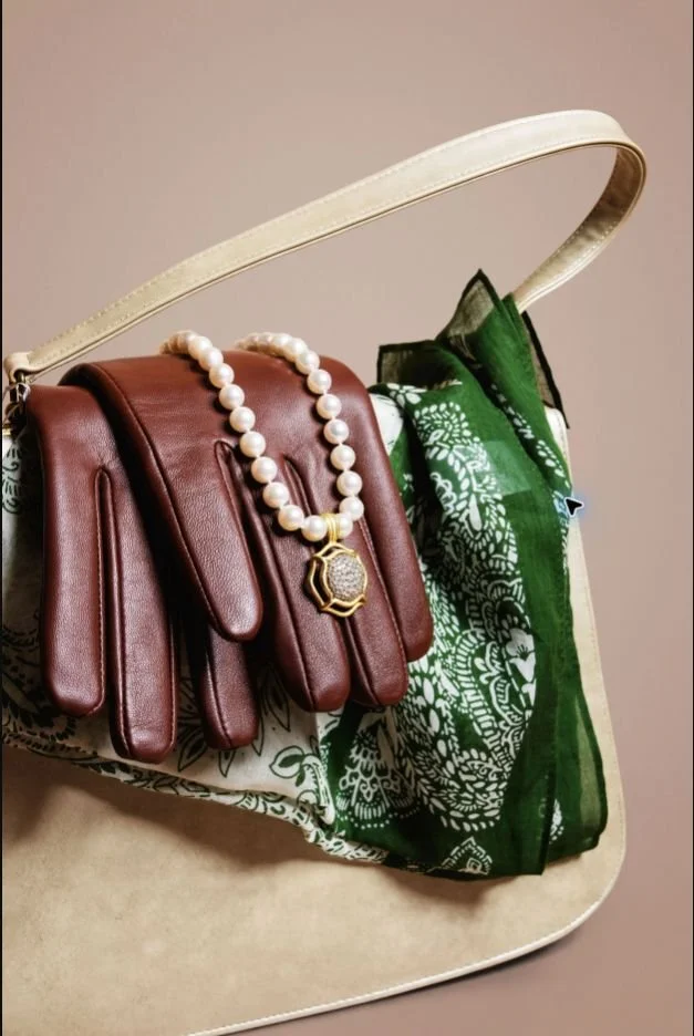 Luxury Jewelry — Pearls and fine jewelry styled with a luxury handbag for an editorial accessories story.