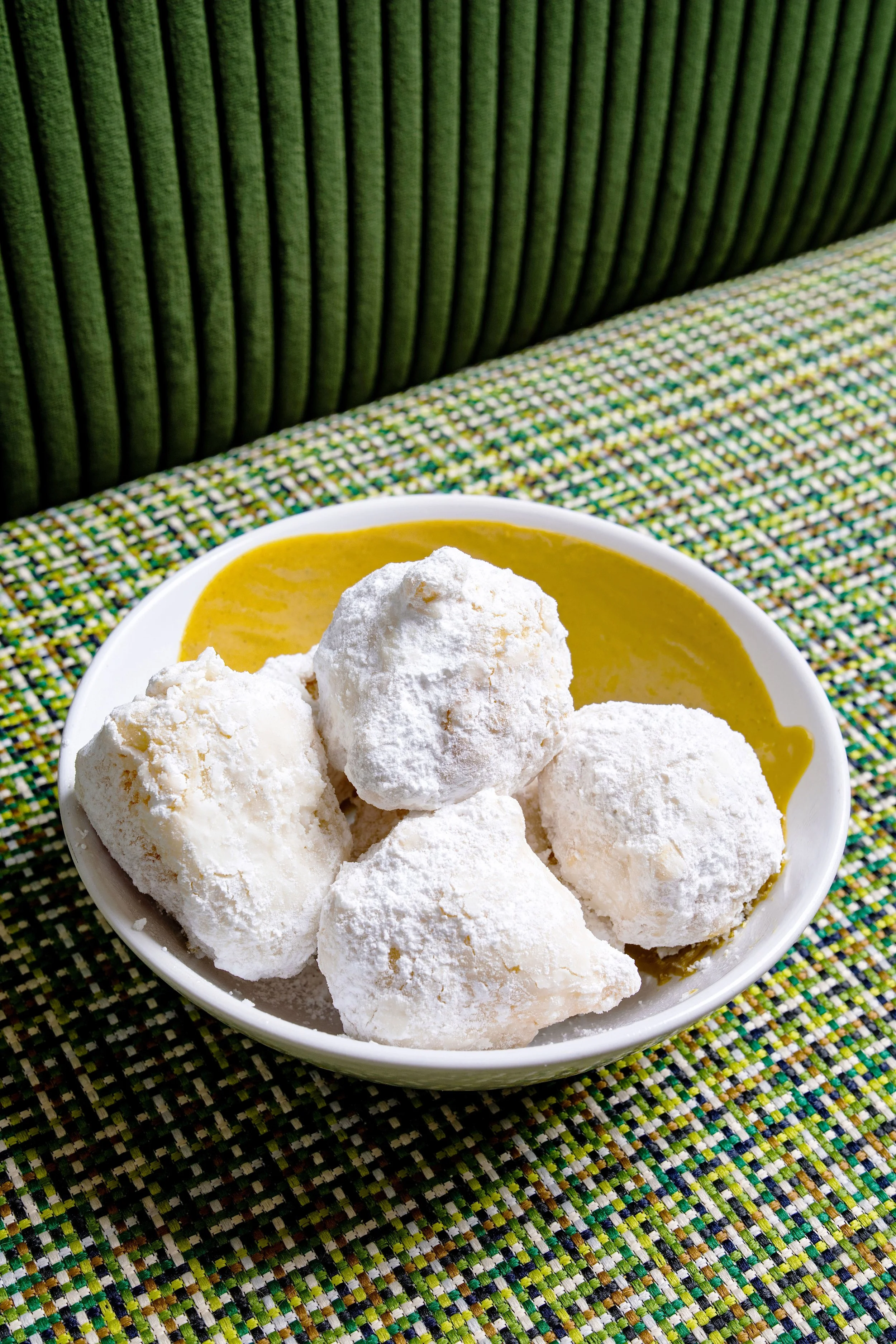 Zeppole dessert plated for an Italian restaurant menu feature, photographed by Fraiche Photography for Edible Asheville.