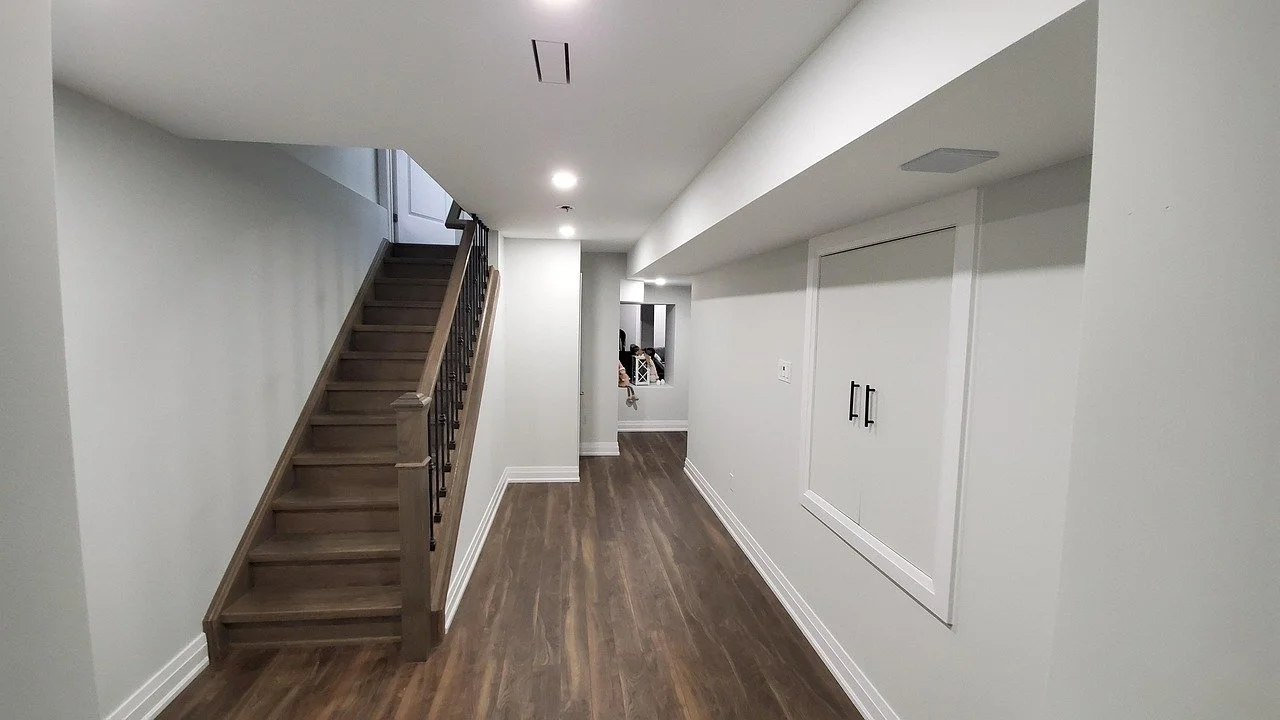 Example after image for basement refinishing services; illustrative stock, not a DM Elite client project