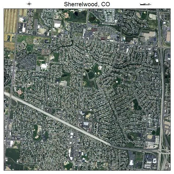 Aerial view of Sherrelwood, Colorado showing a grid of residential streets, commercial areas, and green spaces.