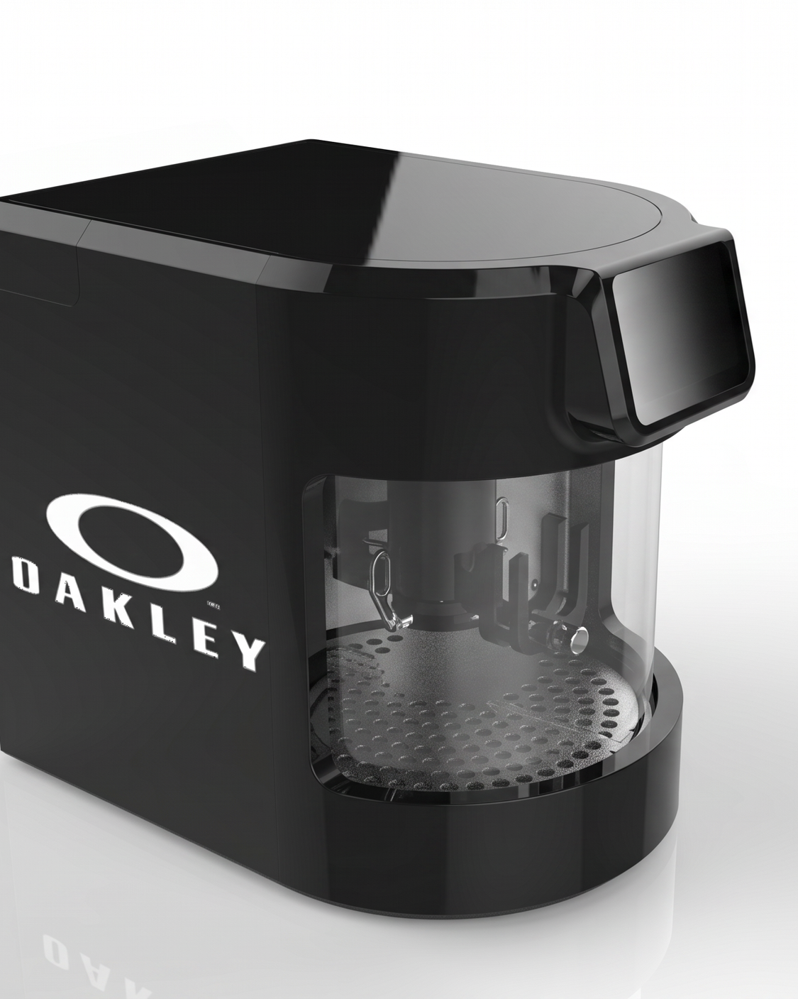 Black coffee machine with a clear panel, Oakley logo, and a metallic drip tray.