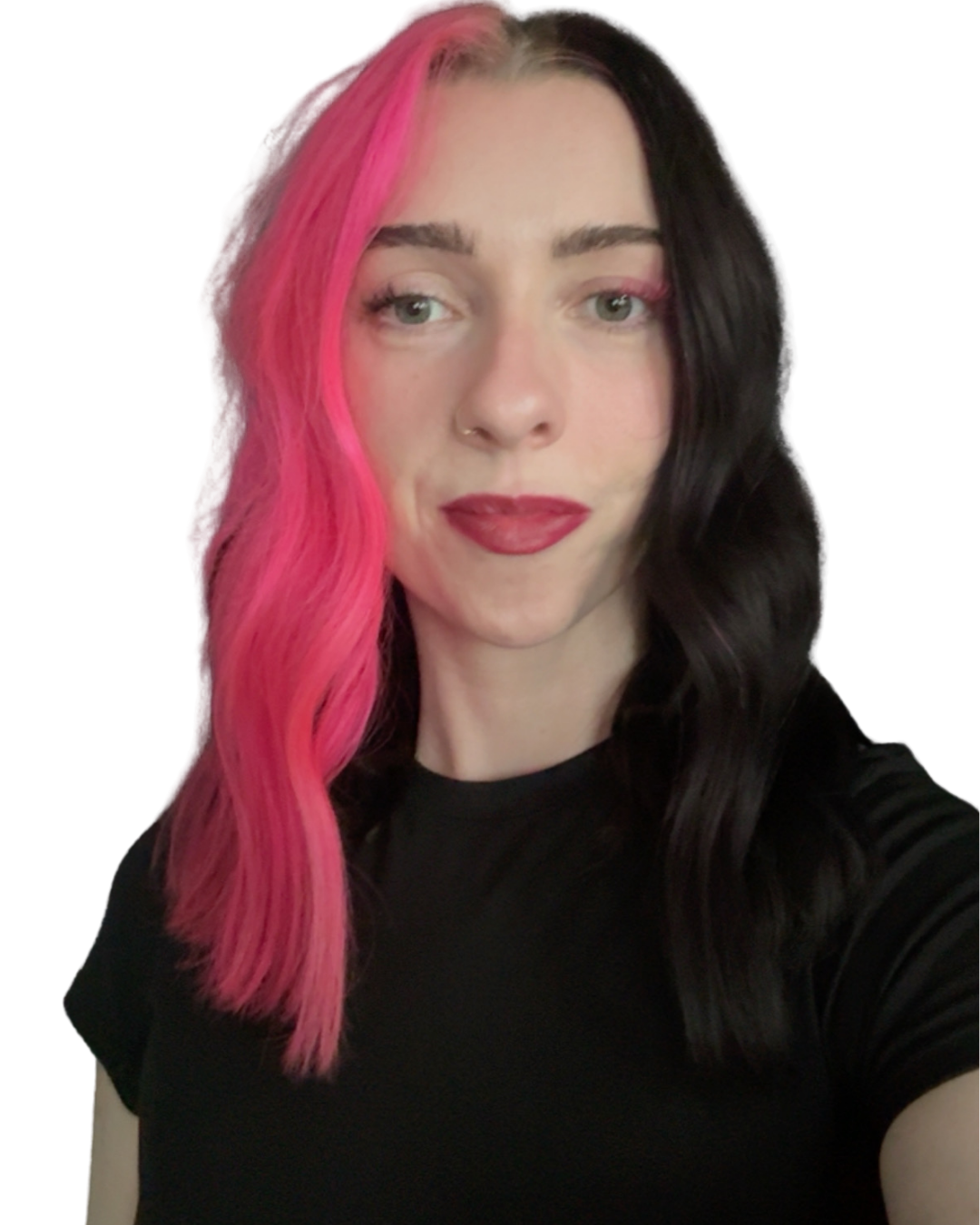 A young woman with black and pink hair, wearing a black top, taking a selfie.
