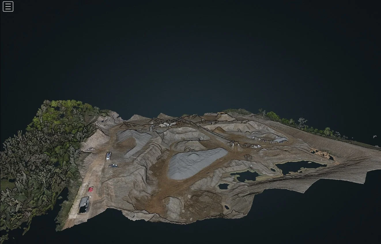 A digital rendering of an open-pit mine with multiple excavation areas, surrounded by trees, parked vehicles, and water pools.