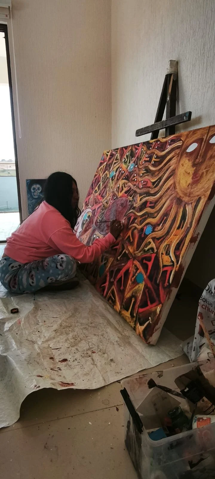 Artista pintando Exvotos