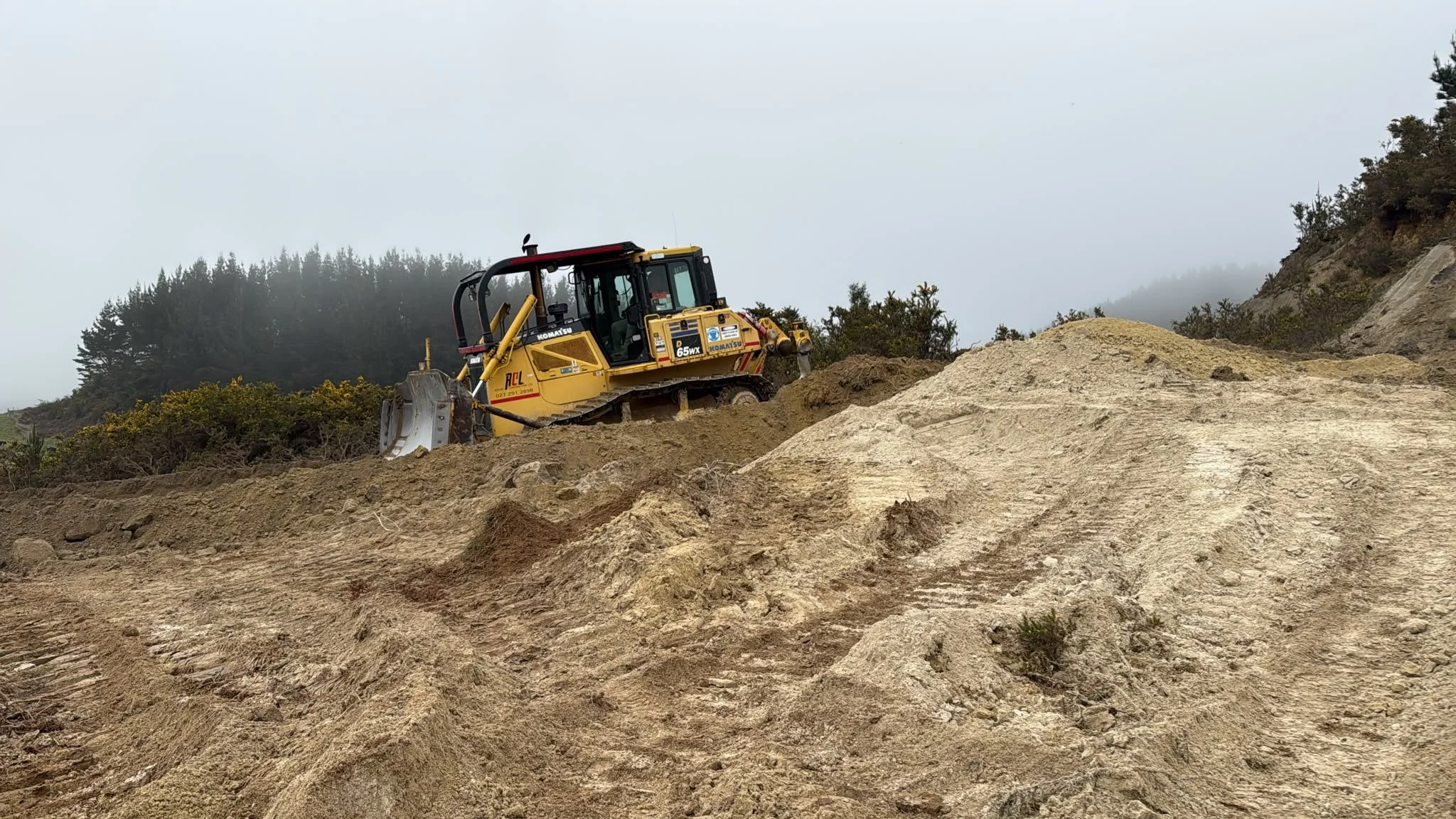 Bulldozer Rouse contracting Home