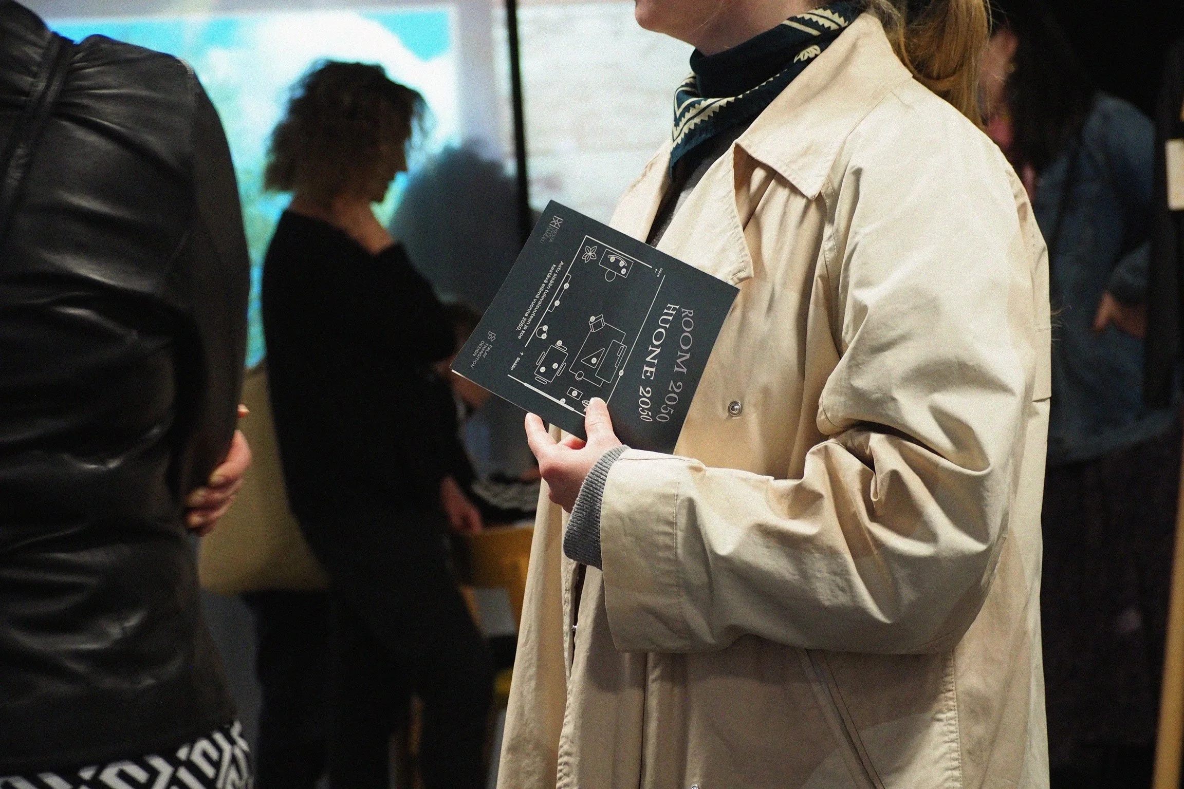 A person standing in an exhibition