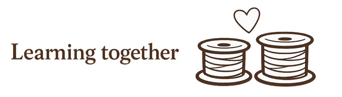 Illustration of two spools of thread with a heart above, along with the text 'Leaming together'.
