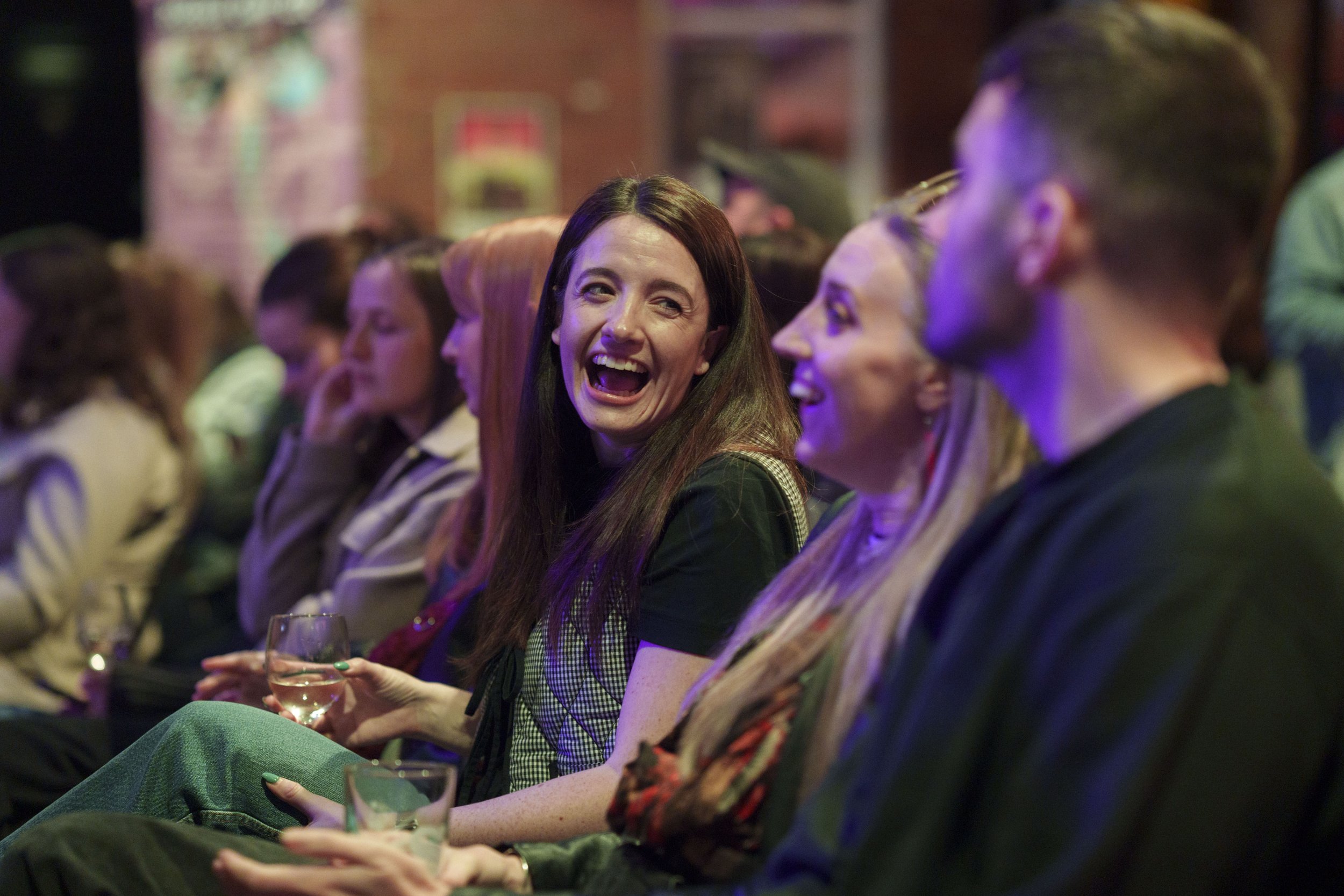 group of people laughing at process events in leeds