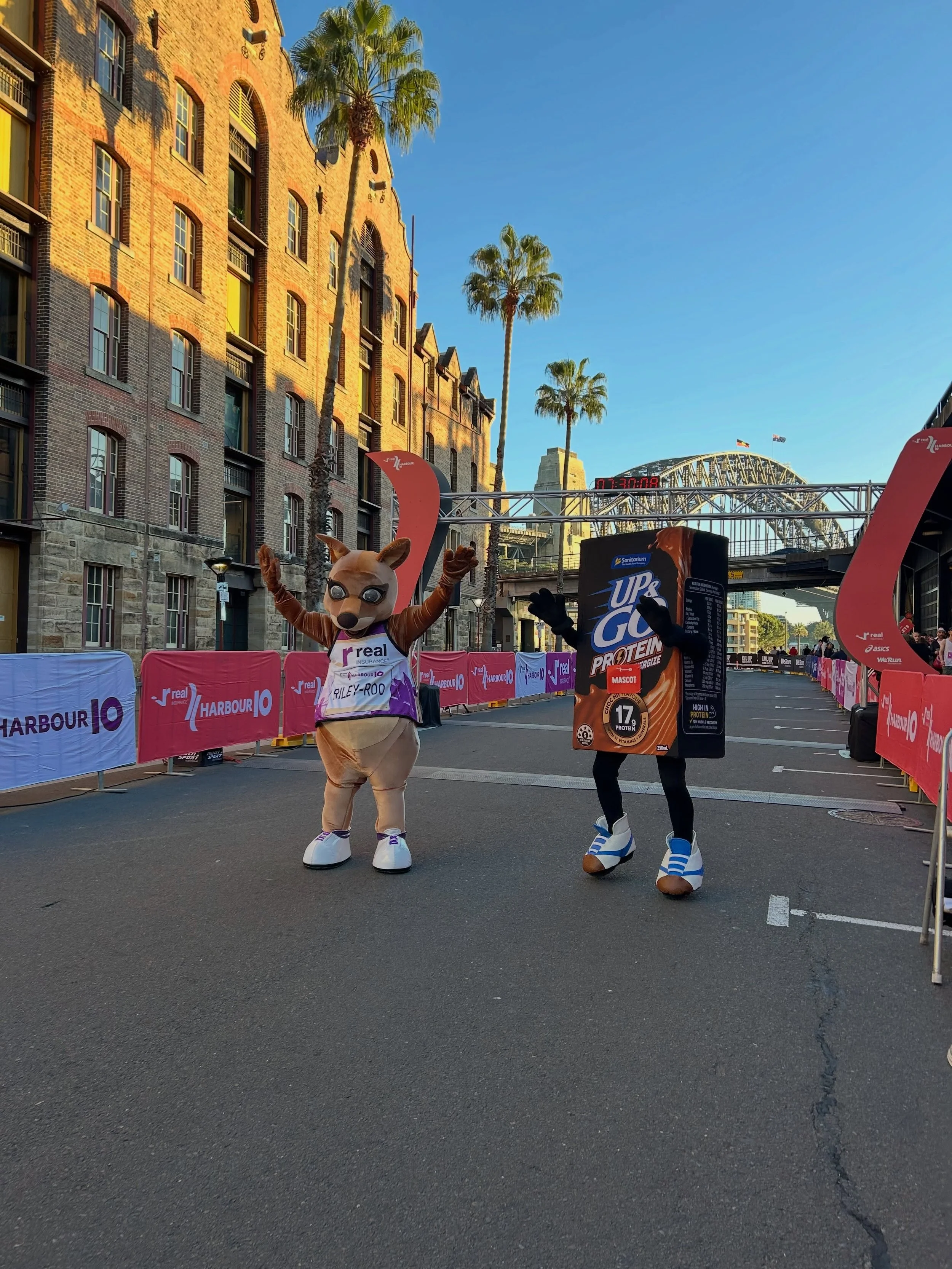 A small taste of the good vibes (and plenty of protein) served by @upandgoau at the @harbour.10 recently 🏃&zwj;♀️✨ Thousands of samples handed out in the glorious sunshine and one very cheeky mascot keeping runners and spectators smiling.

I&rsquo;v