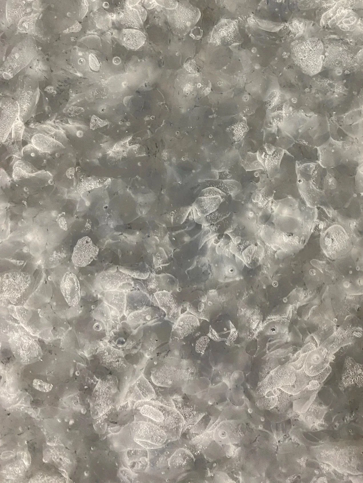 Close-up of the tiles made from recycling pharmaceutical glass waste.