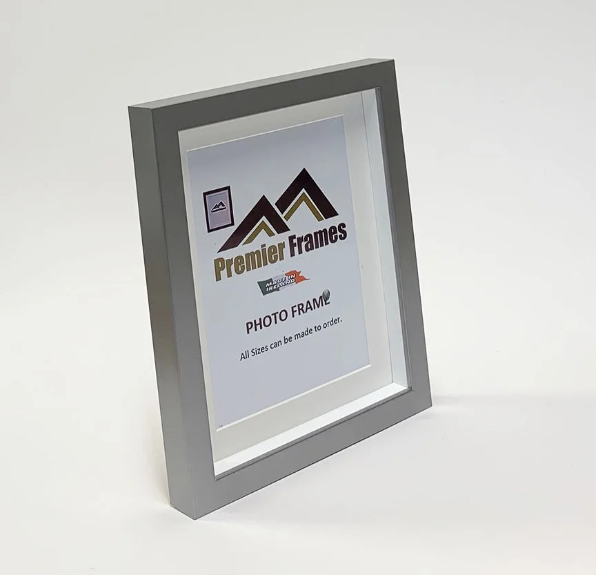 BF32GS Single Shadow Box Frame Smooth Flat Graphite Silver Wood 30mm Deep x 20mm on face with 20mm White spacer.