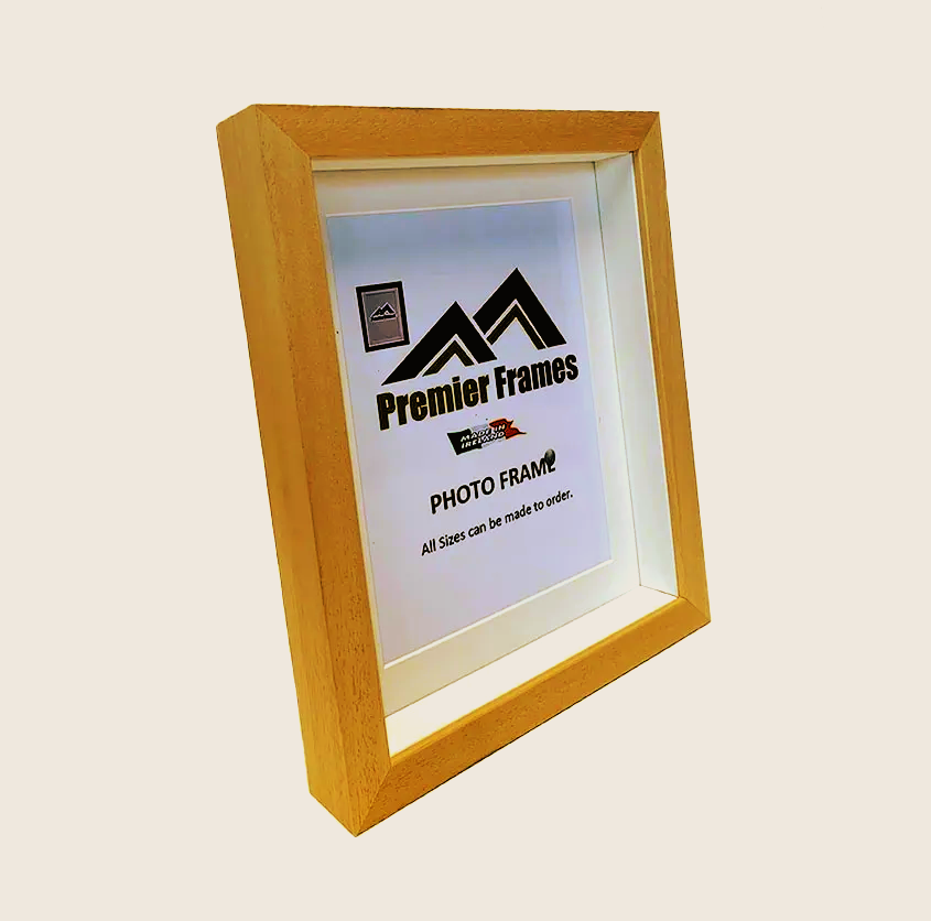 BF32WM Single Shadow Box Frame Light Wood Grain (Honey) 30mm Deep x 20mm on face with 20mm White spacer.