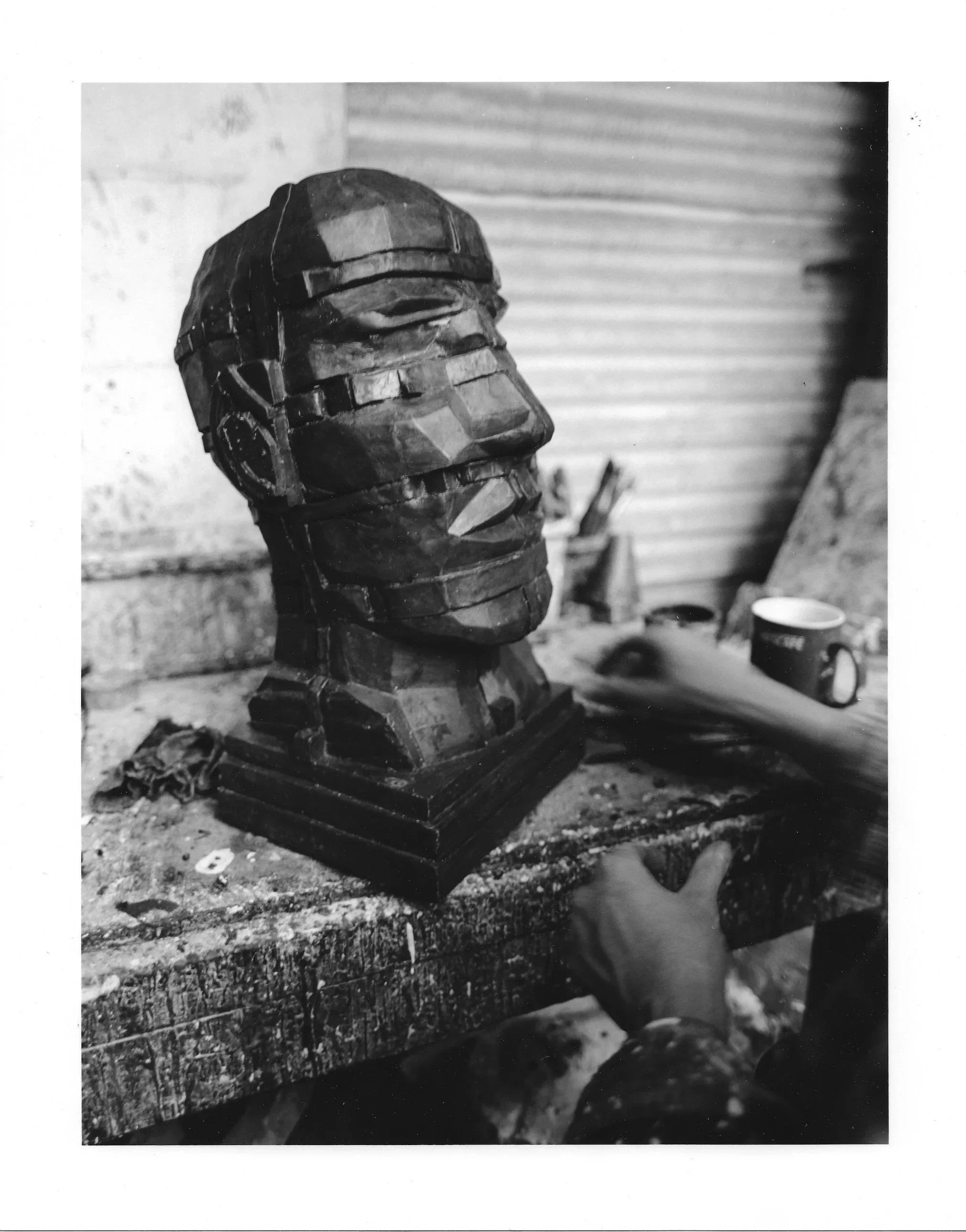 Wax version of Eduardo Paolozzi’s Head, 1993, on a workbench at Arch Bronze.
