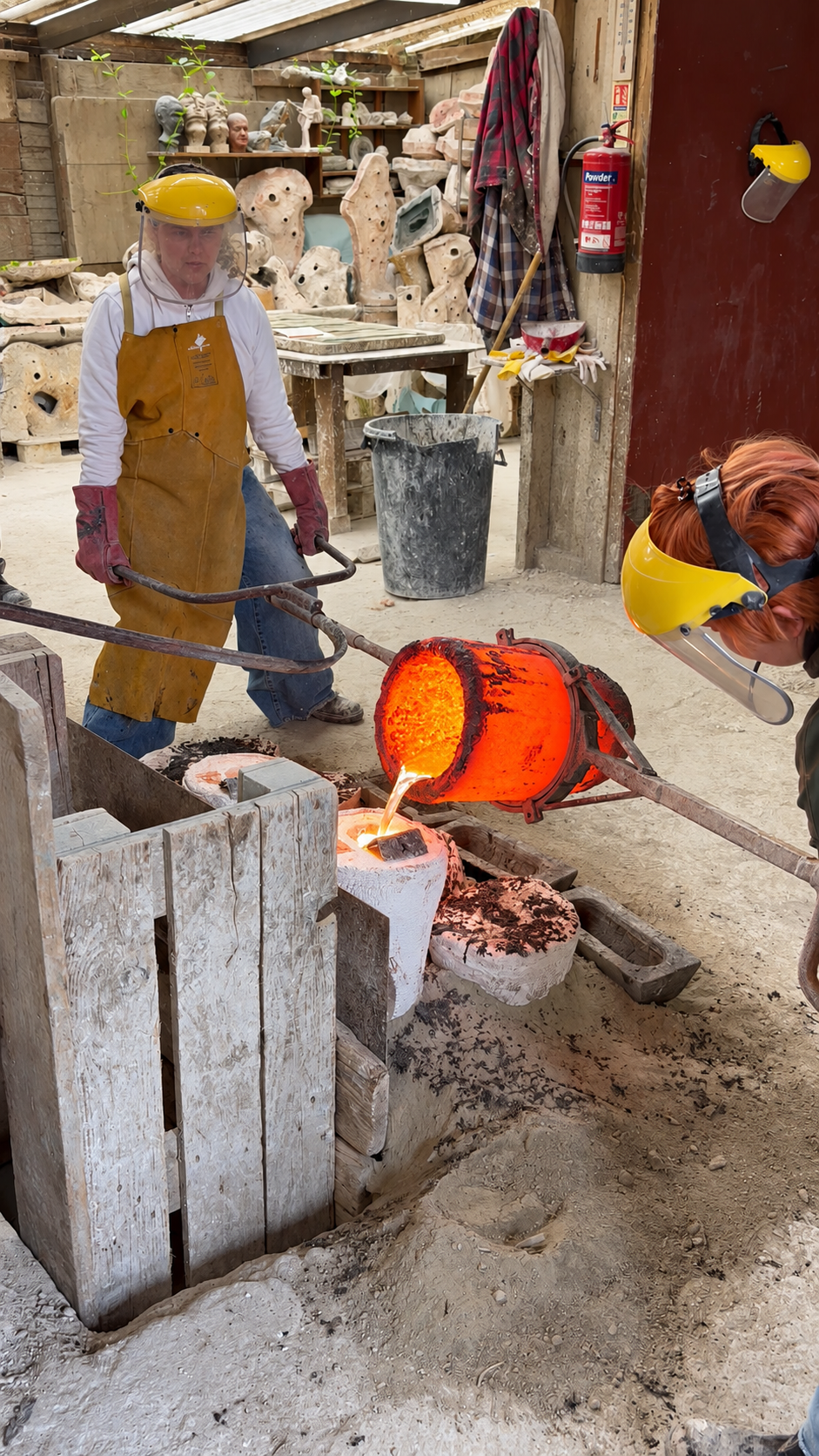 Molten aluminium being poured into a mould at Arch Bronze.