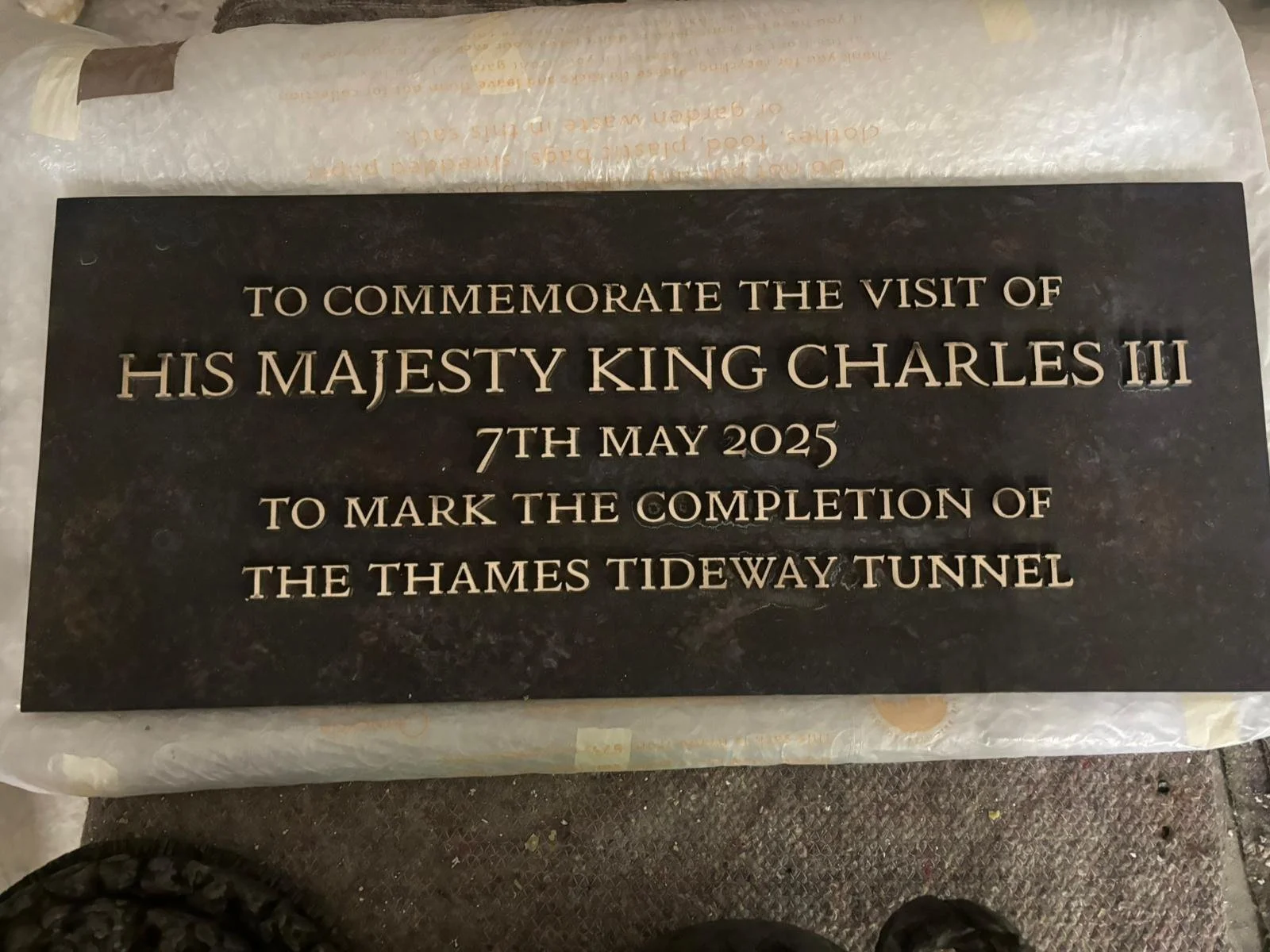 Bronze plaque commemorating the visit of His Majesty King Charles III on 7 May 2025 to mark completion of the Thames Tideway Tunnel.