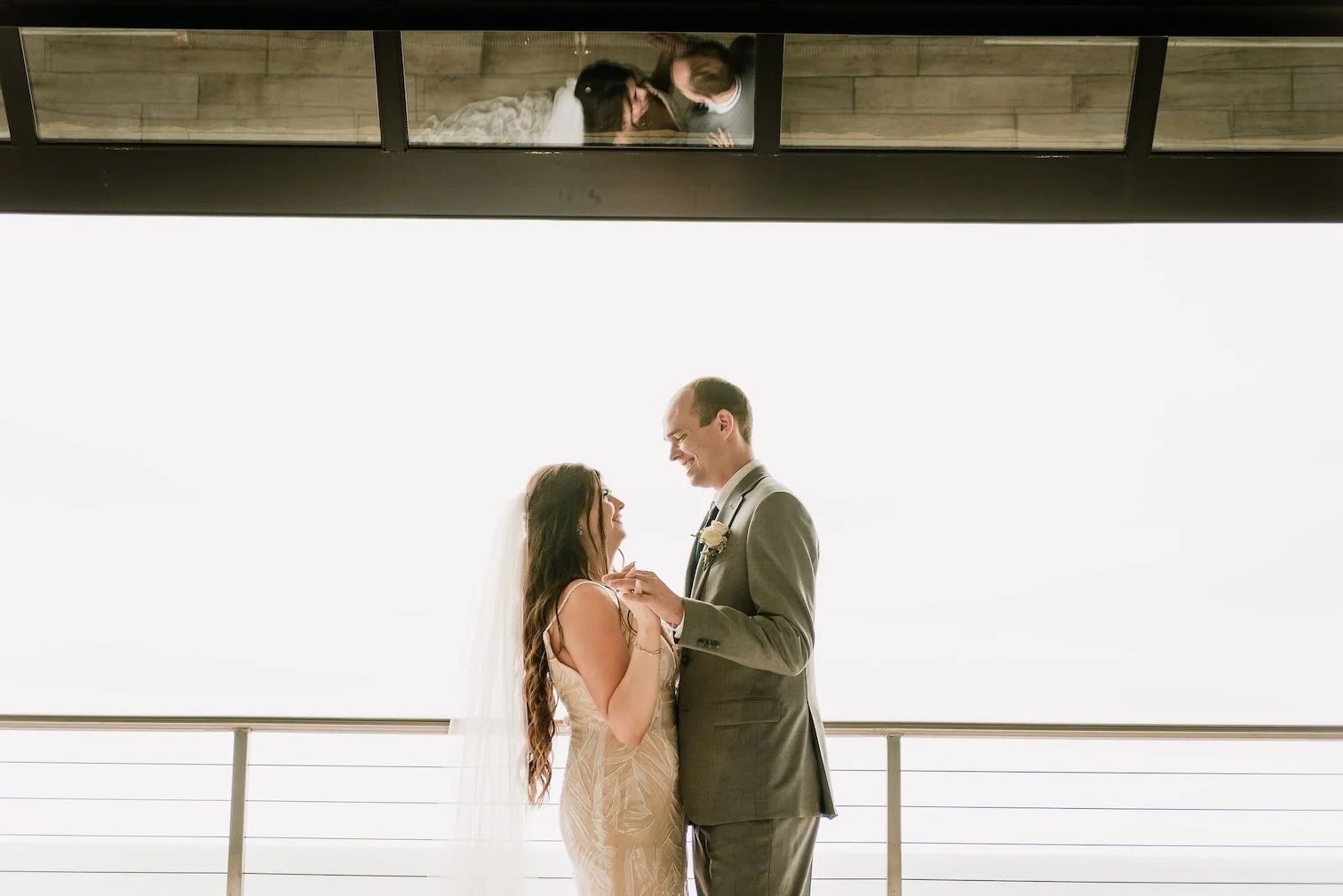 bride and groom at noto's on the water