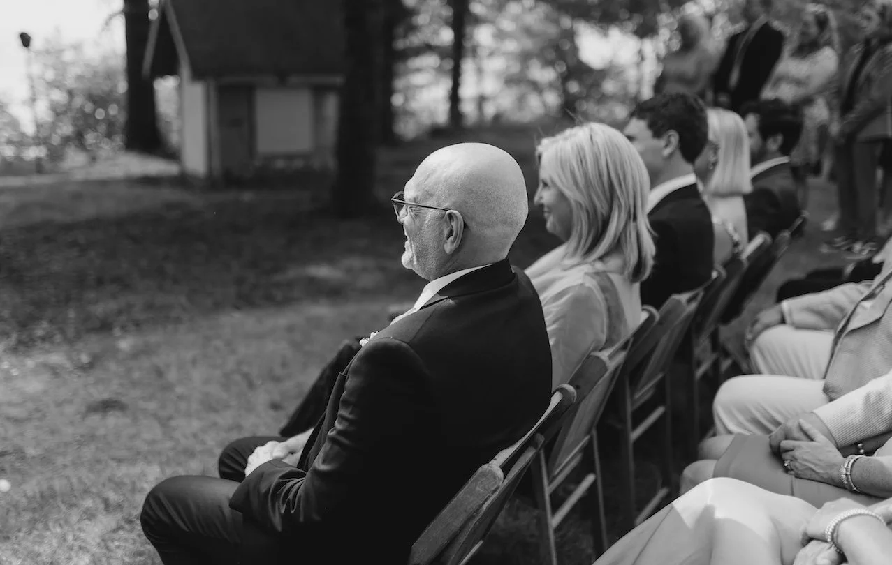 Emotional Wedding Ceremony Moment | Torch Lake Candid Parent Portrait