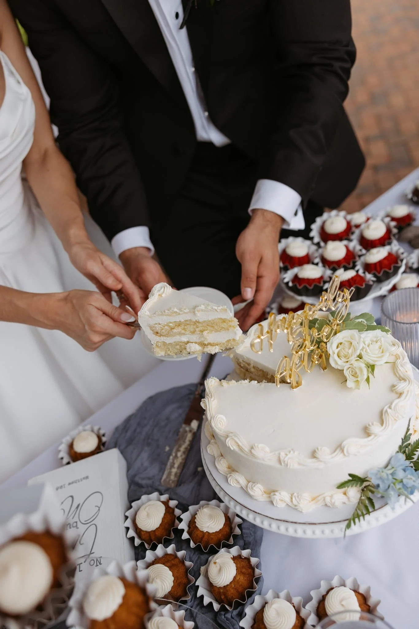 Cake Cutting Moment in Petoskey, Michigan | Editorial Wedding Reception Detail