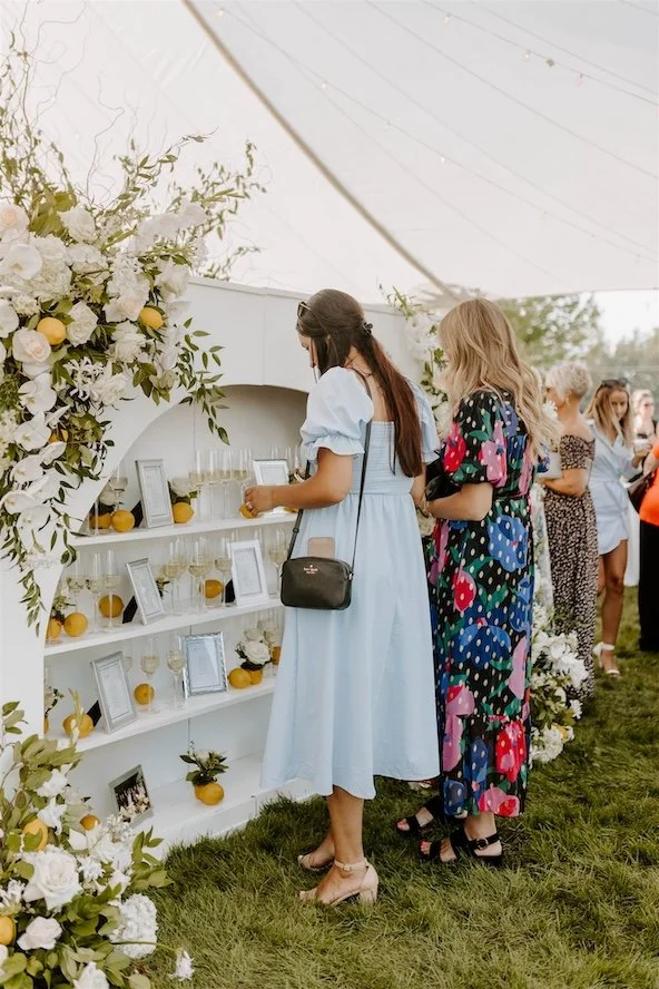 Champagne Escort Display | Guest Seating Wall | Lake Michigan Wedding