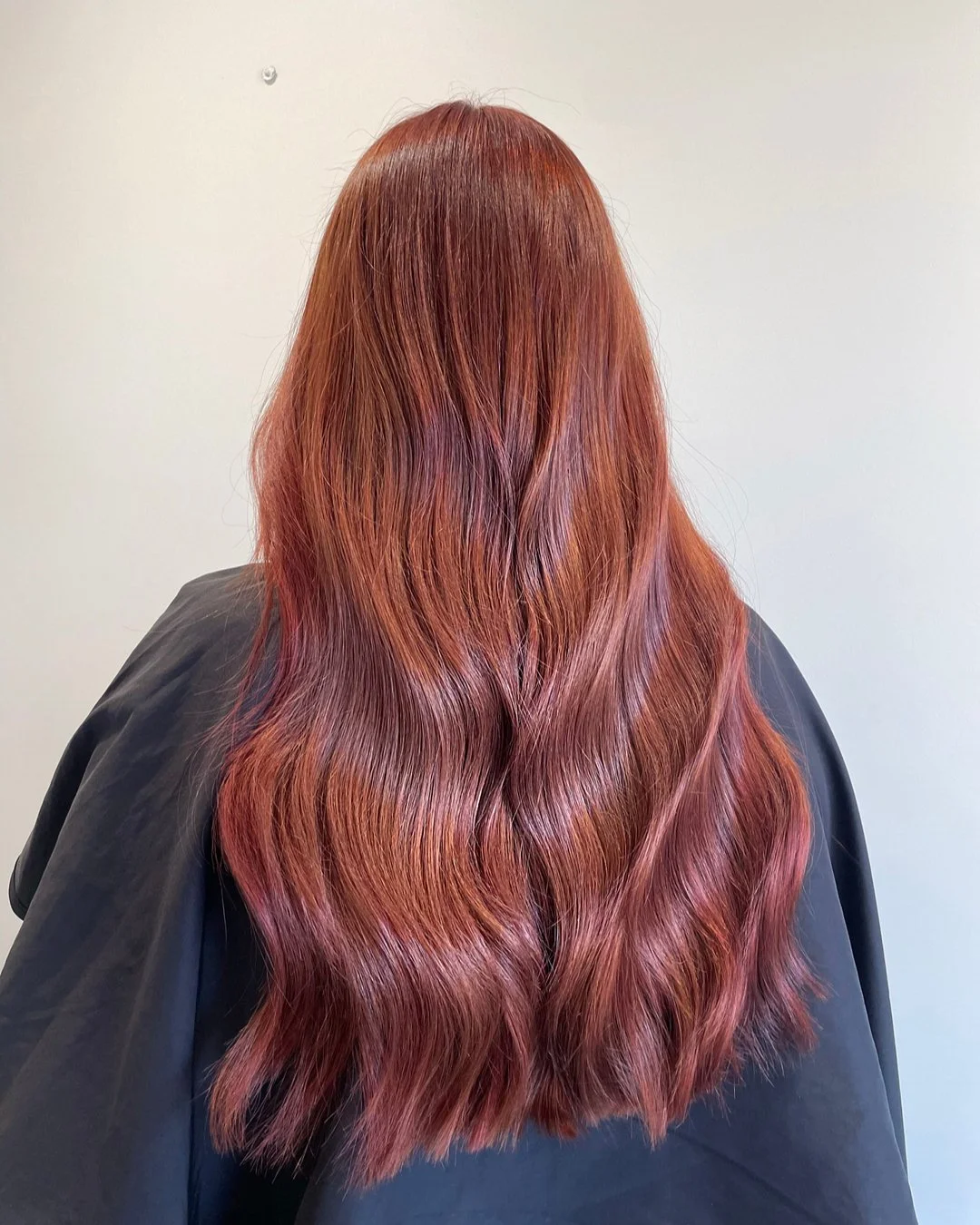 Rich glossy auburn colour transformation created at Alkemi Salon in Mount Pleasant, Perth.